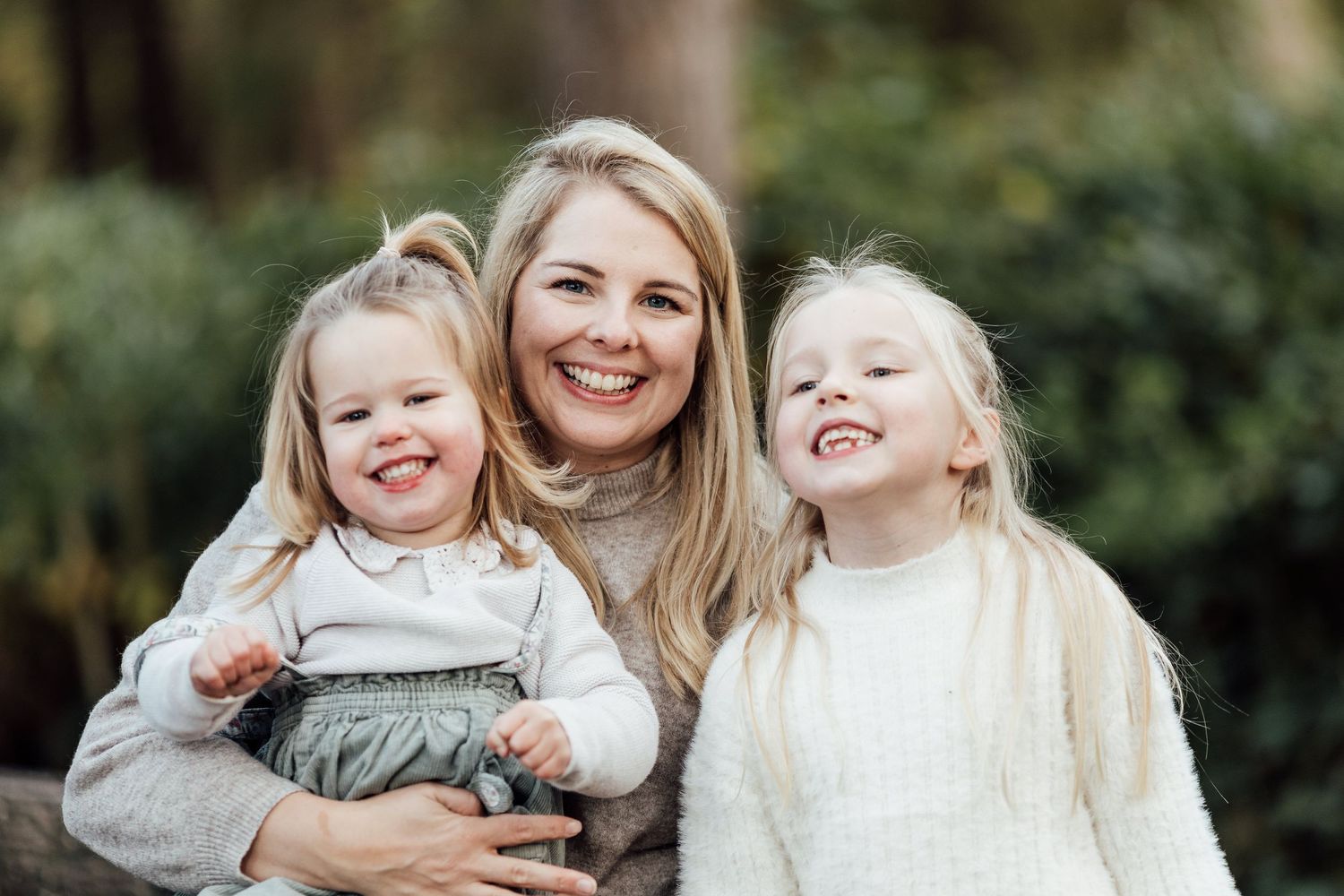 A series of candid outdoor family portraits showing joyful moments between a parent and children.