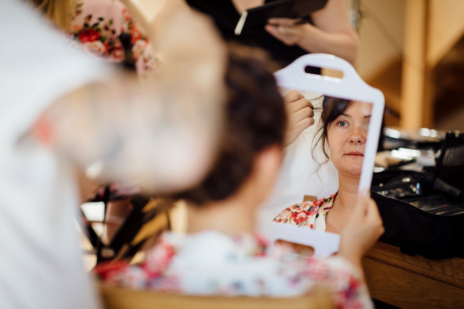 Wedding preparation moments captured through candid photography.
