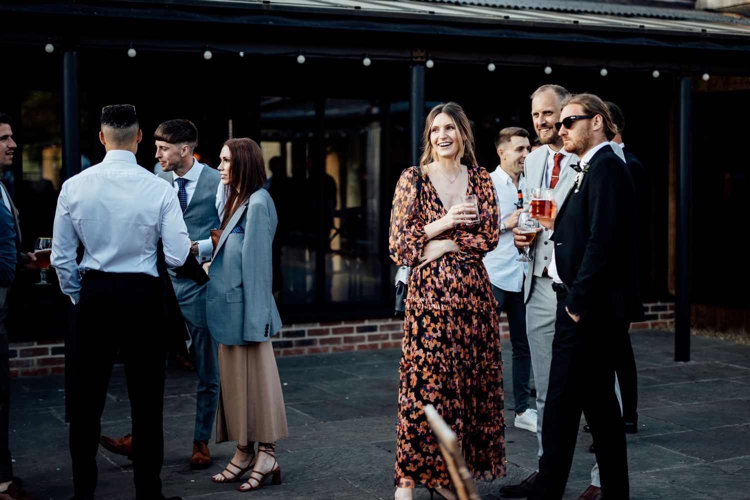 Guests enjoying cocktail hour at an elegant wedding reception.