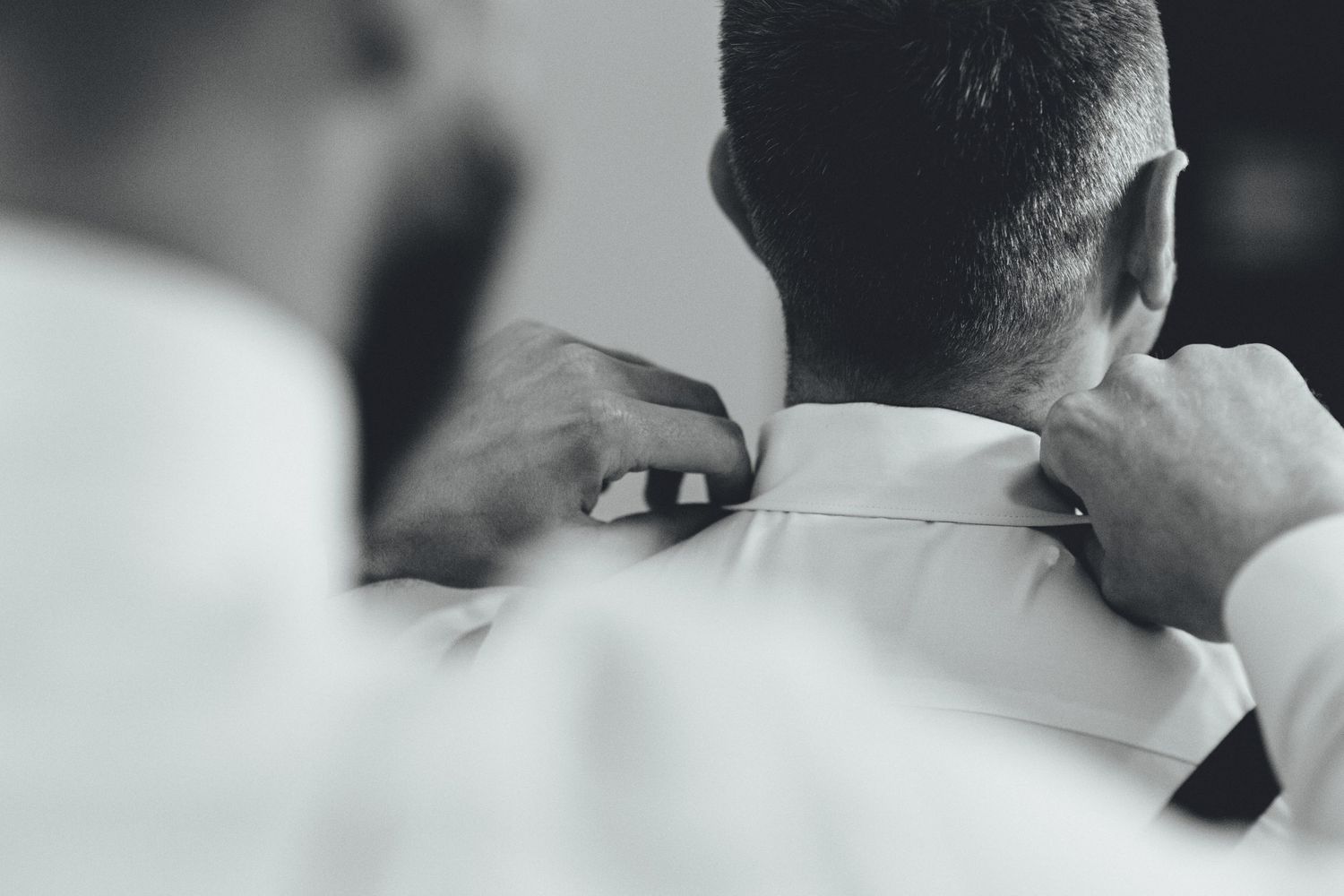 Close up detail of formal wear and grooming preparations.