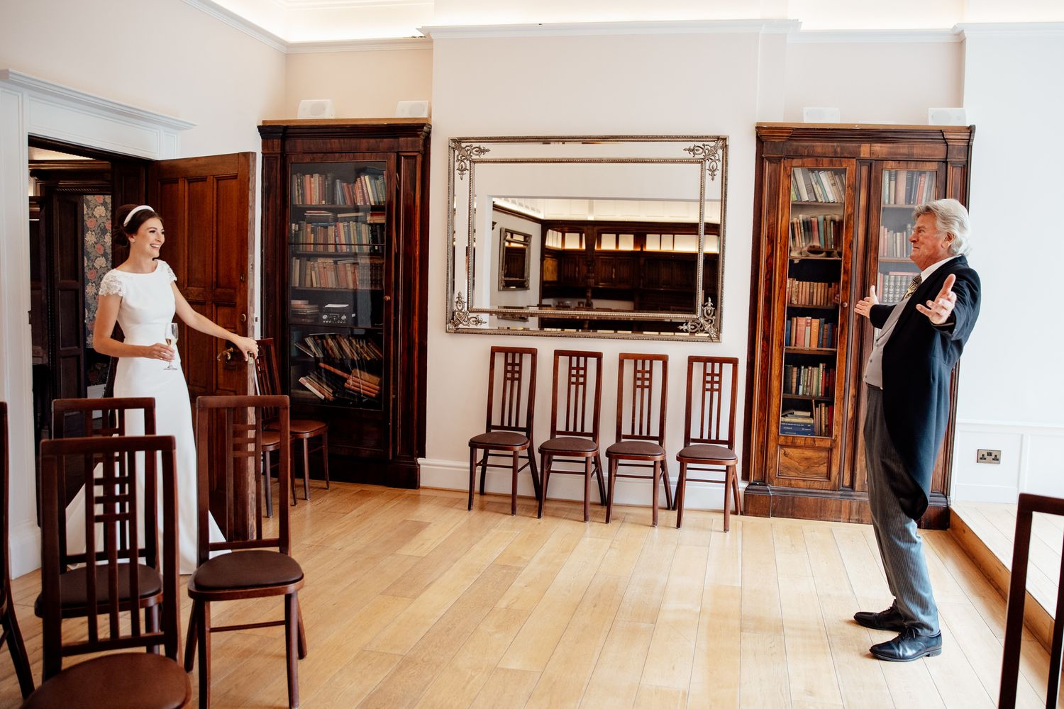 Interior view of an elegant room with wooden furniture and classic decor.