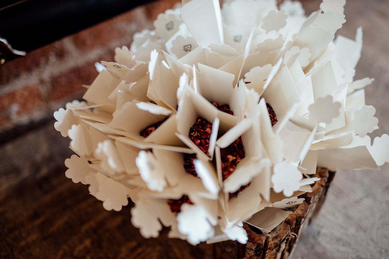 Delicate white paper flowers arranged in an elegant display.