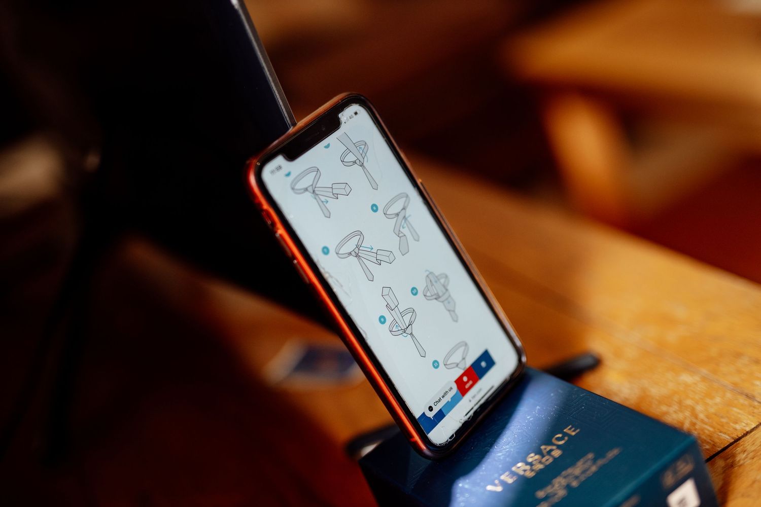Wedding planning details shown on mobile phone screen.
