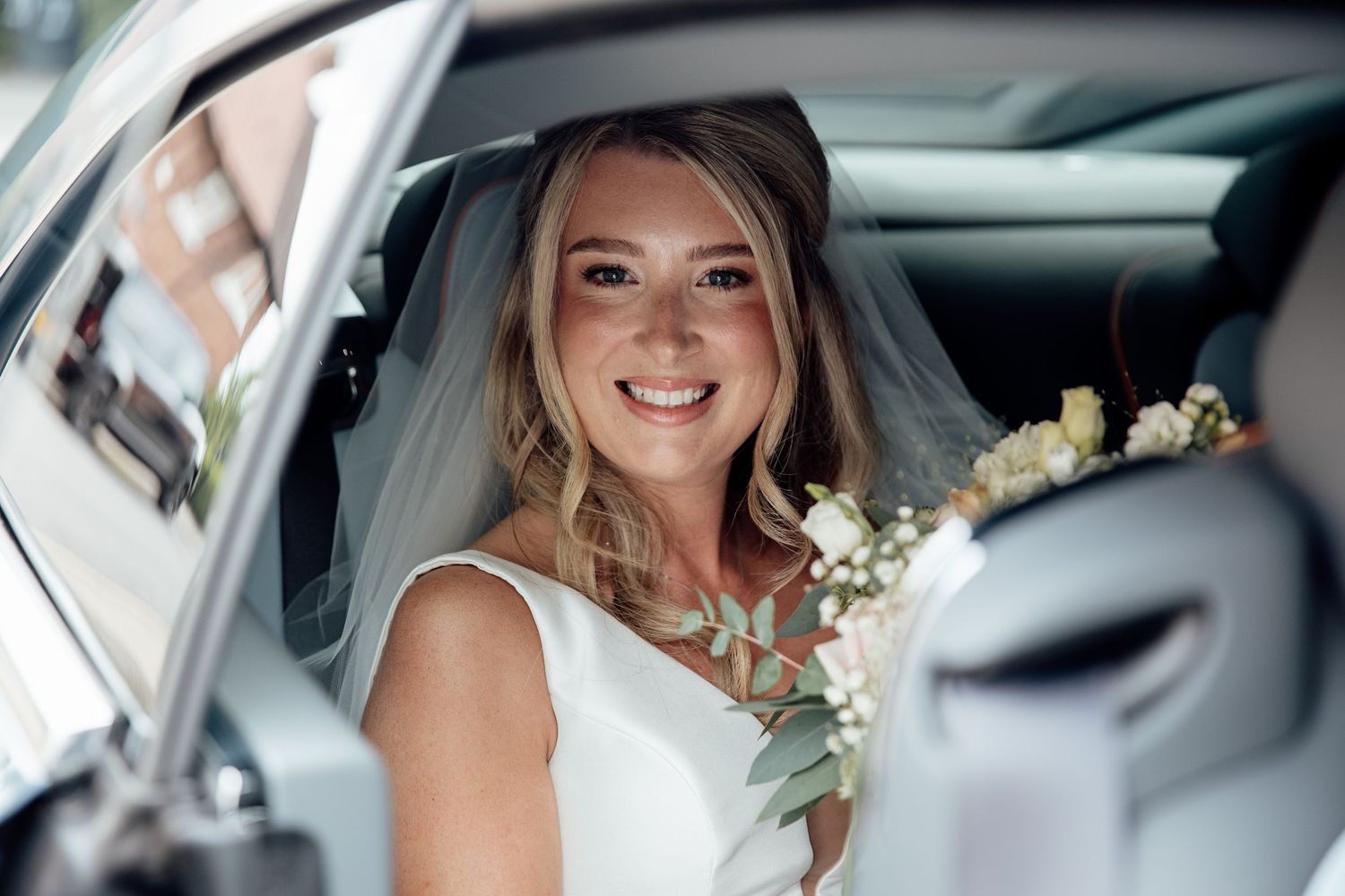 Elegant wedding transportation moments captured through car window frames.