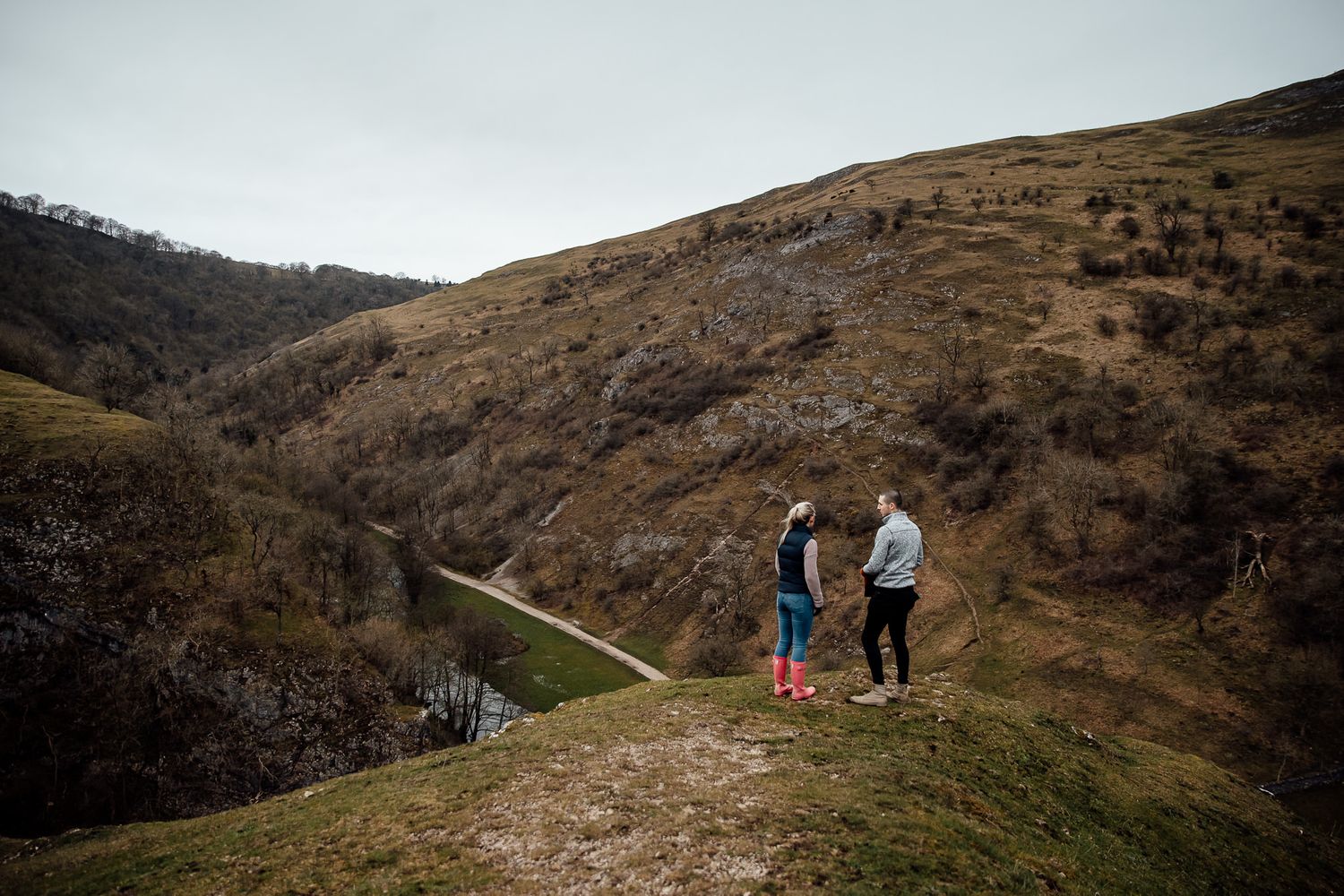 Scenic view of hiking trails winding through brown hillsides.