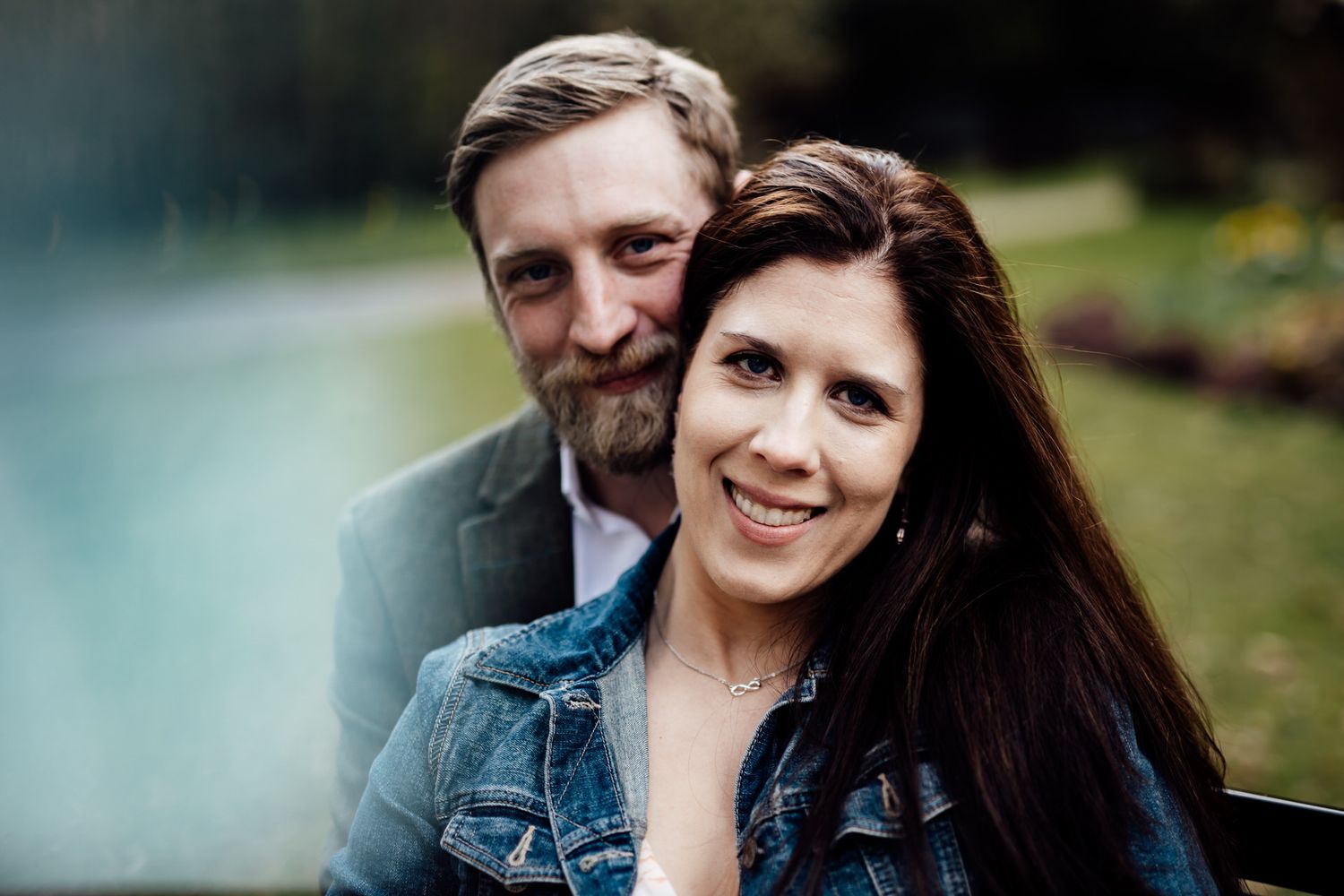 A couple shares a joyful moment together outdoors.