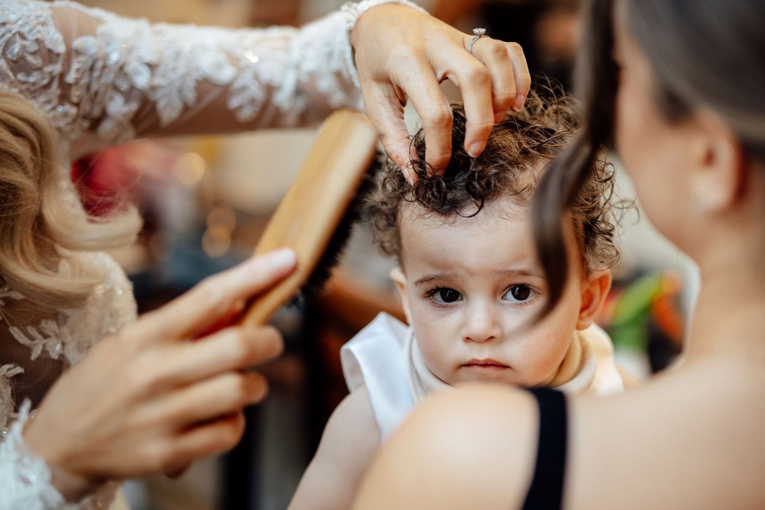Close-up shots of wedding day preparation and styling moments.