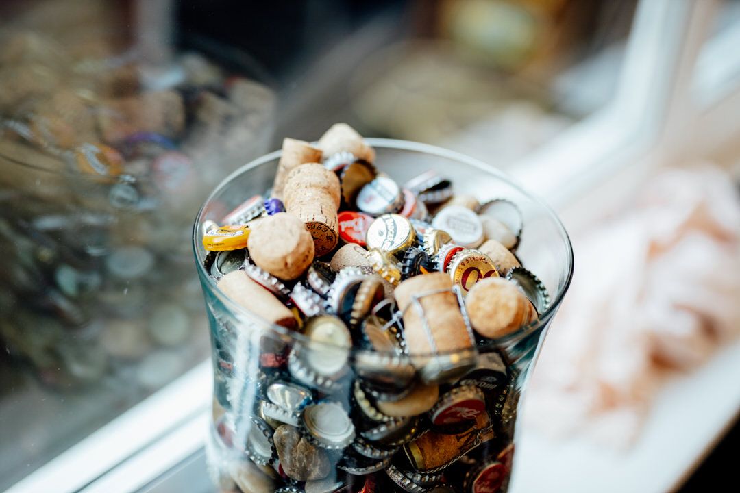 Gourmet dessert served in a glass bowl with chocolate and cream toppings.