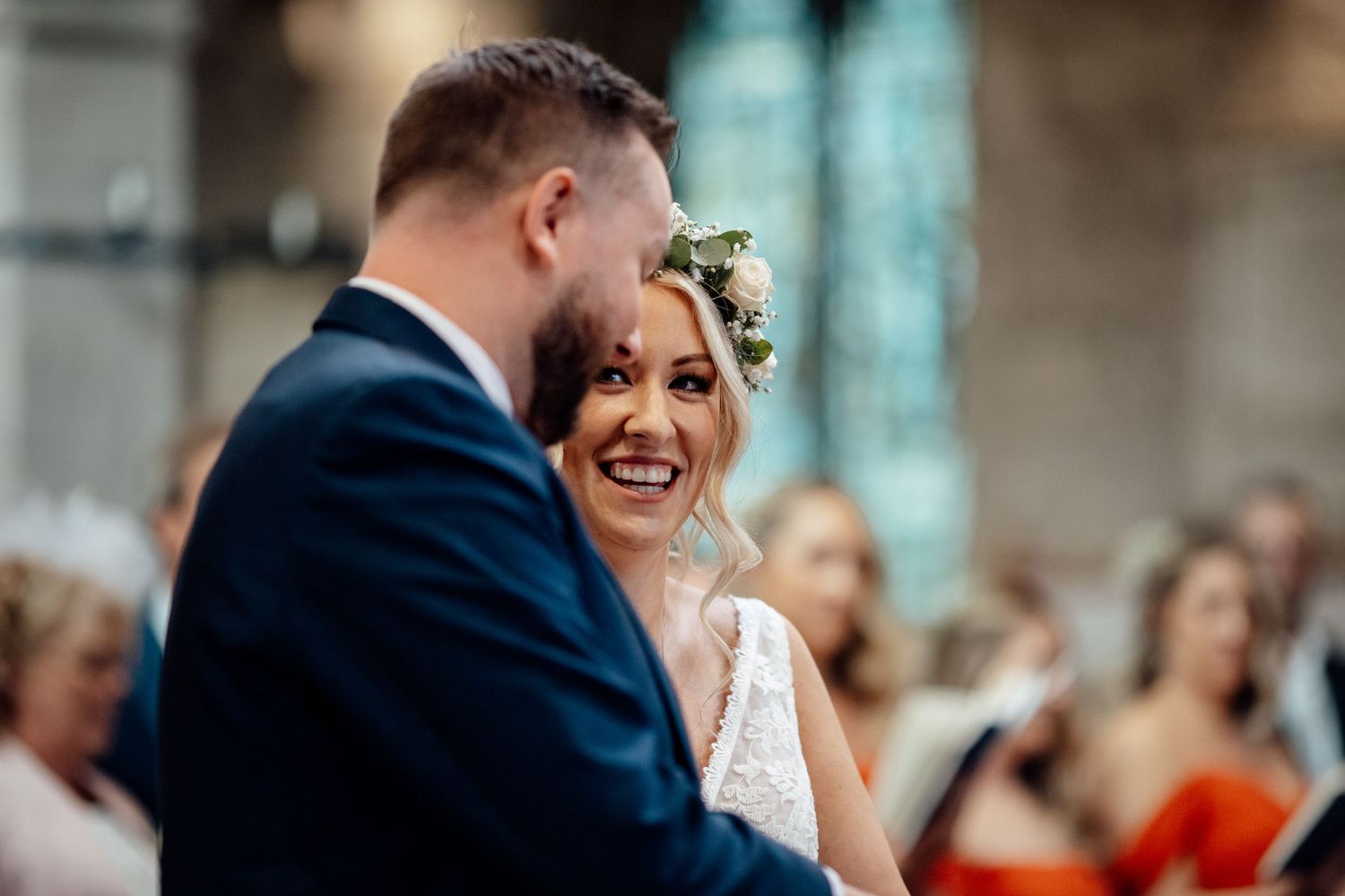 A joyful moment shared between a couple during a wedding ceremony.
