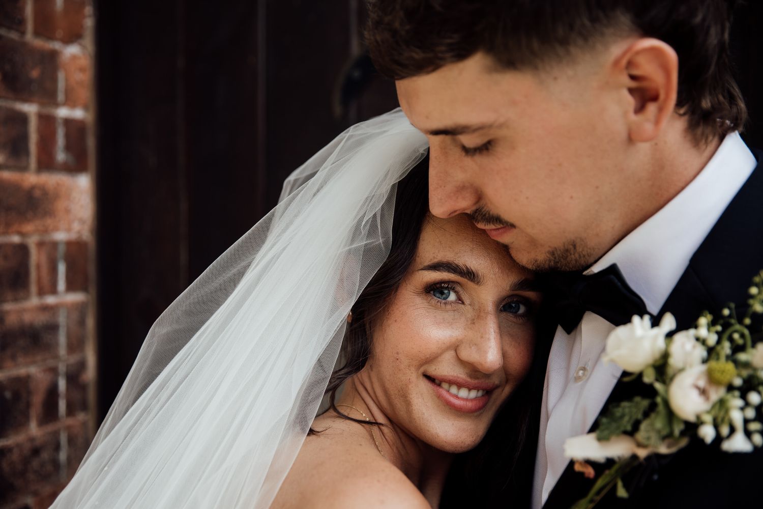 Romantic close-up wedding portraits in elegant black and white.