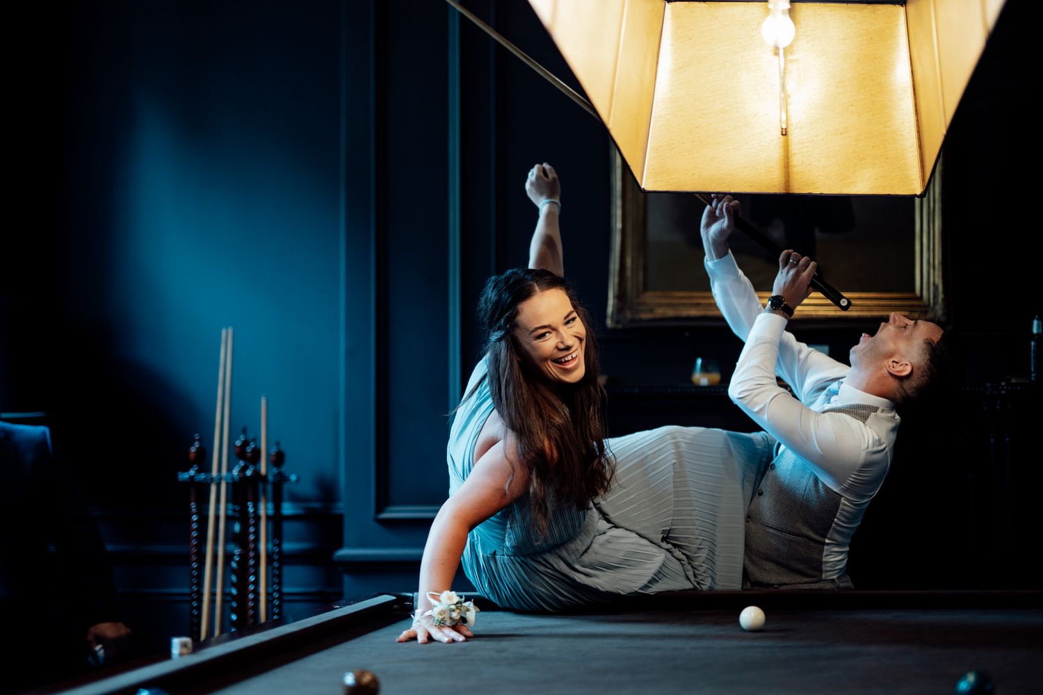 Dramatic moody indoor photography with artistic lighting and shadows.