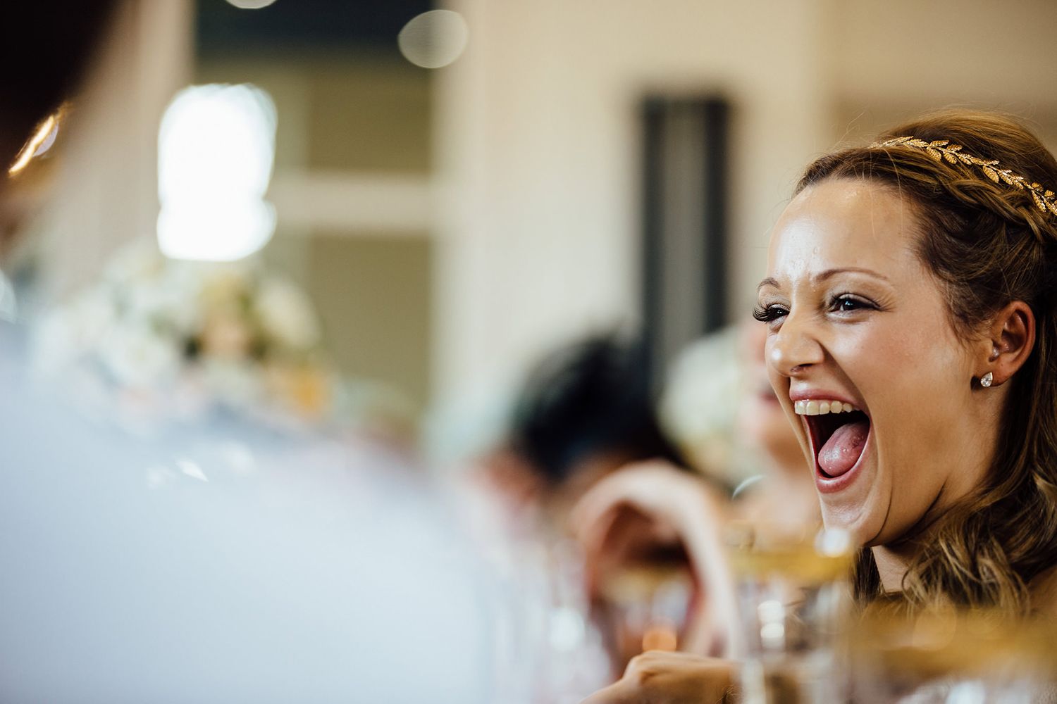 A joyful celebration moment captured during a wedding reception.