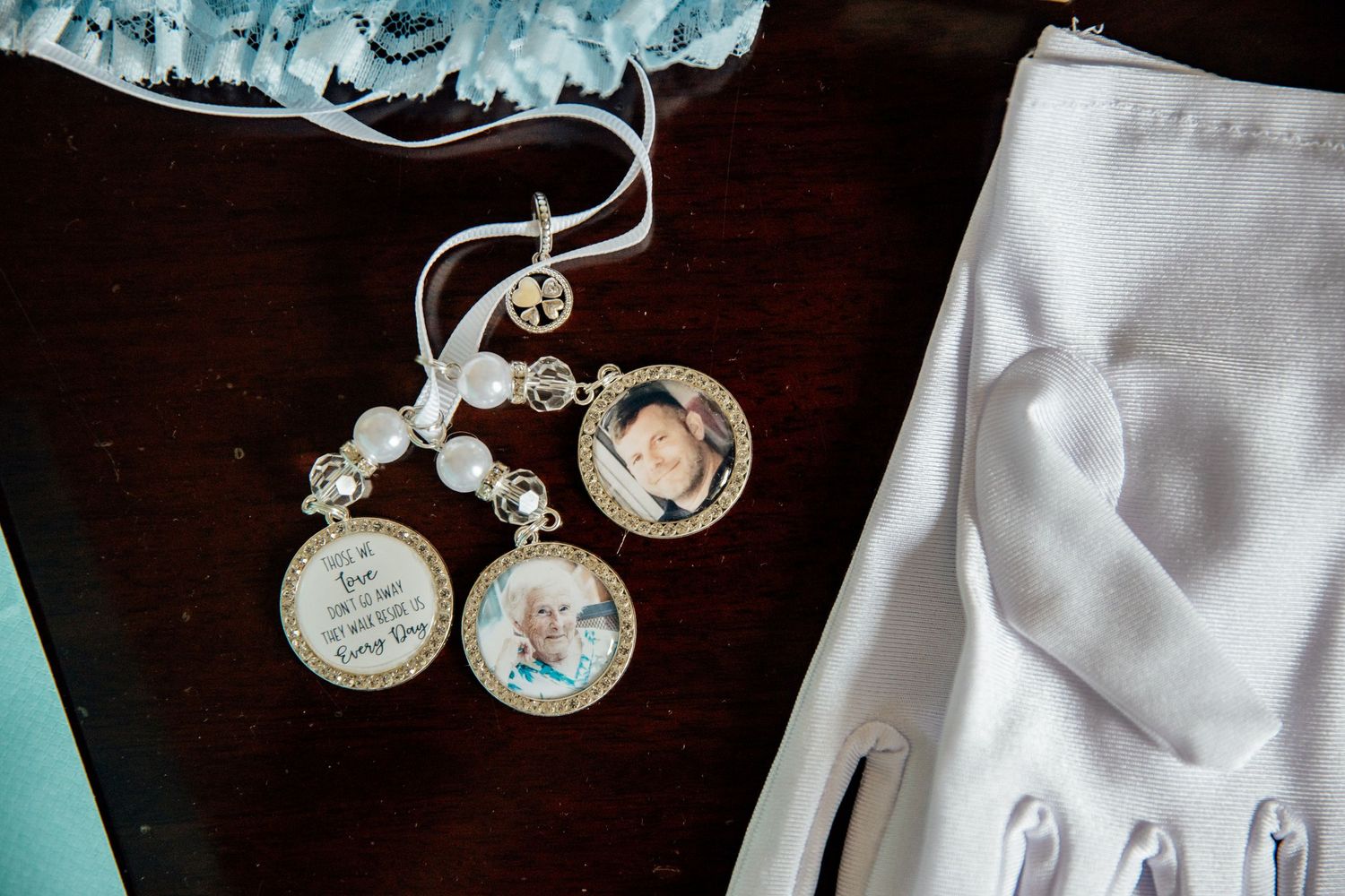 Vintage style wedding jewelry and accessories displayed on dark background.