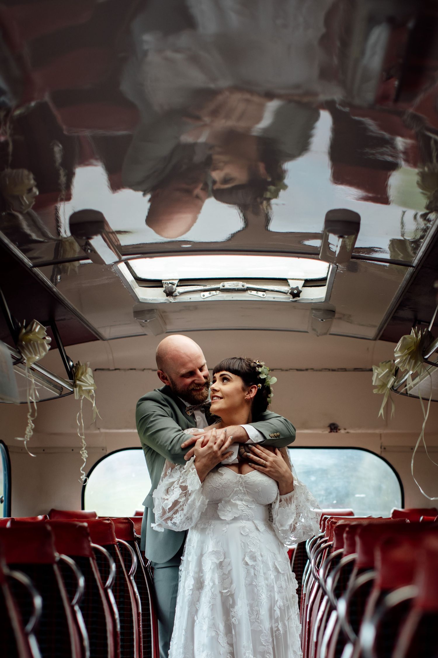 Vintage red and white vehicle interior decorated for wedding transportation.