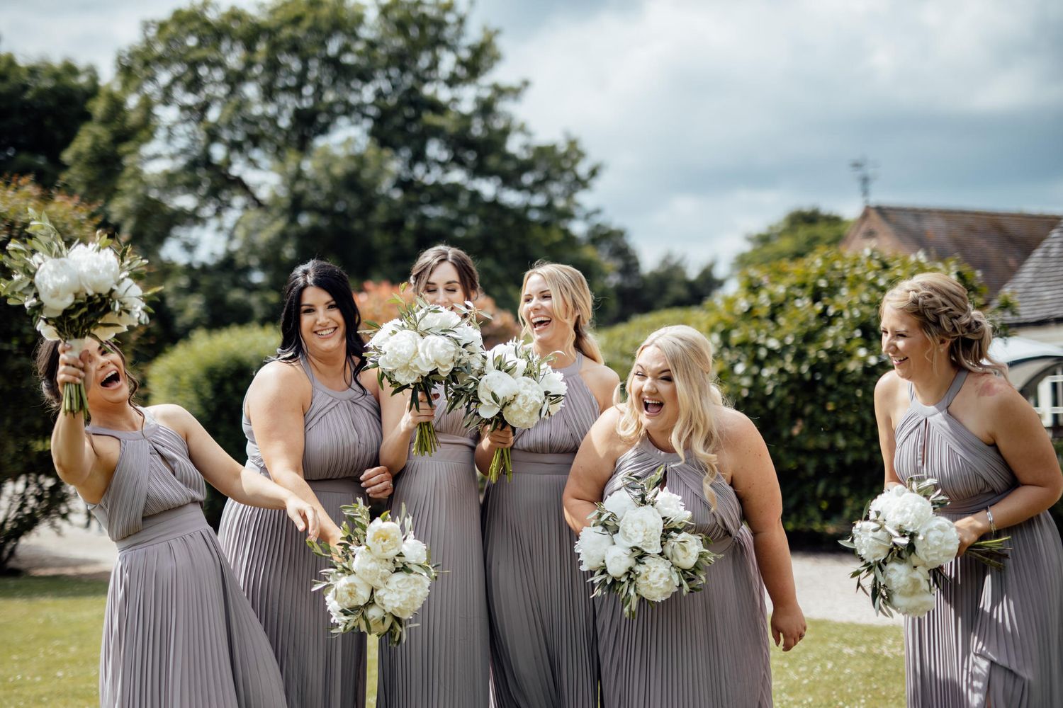 bridesmaids clowning around