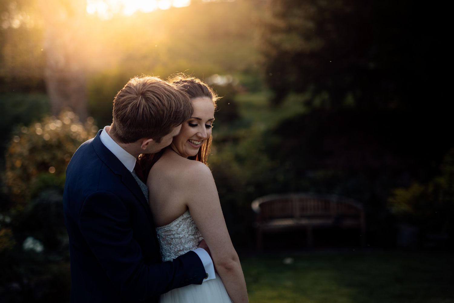 Intimate wedding moments captured during golden hour in a garden setting.