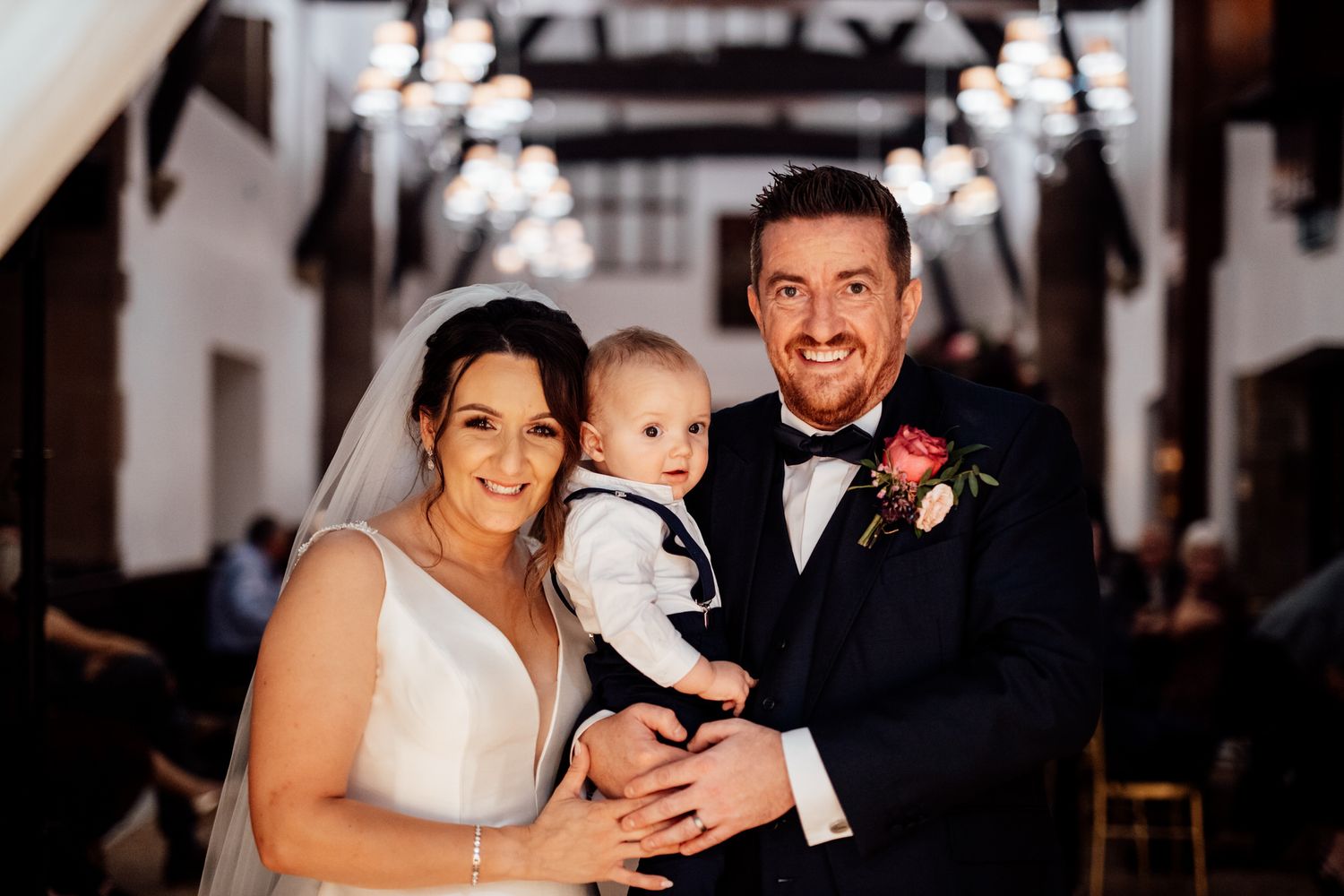 Candid reception moments captured in warm lighting with natural interactions.