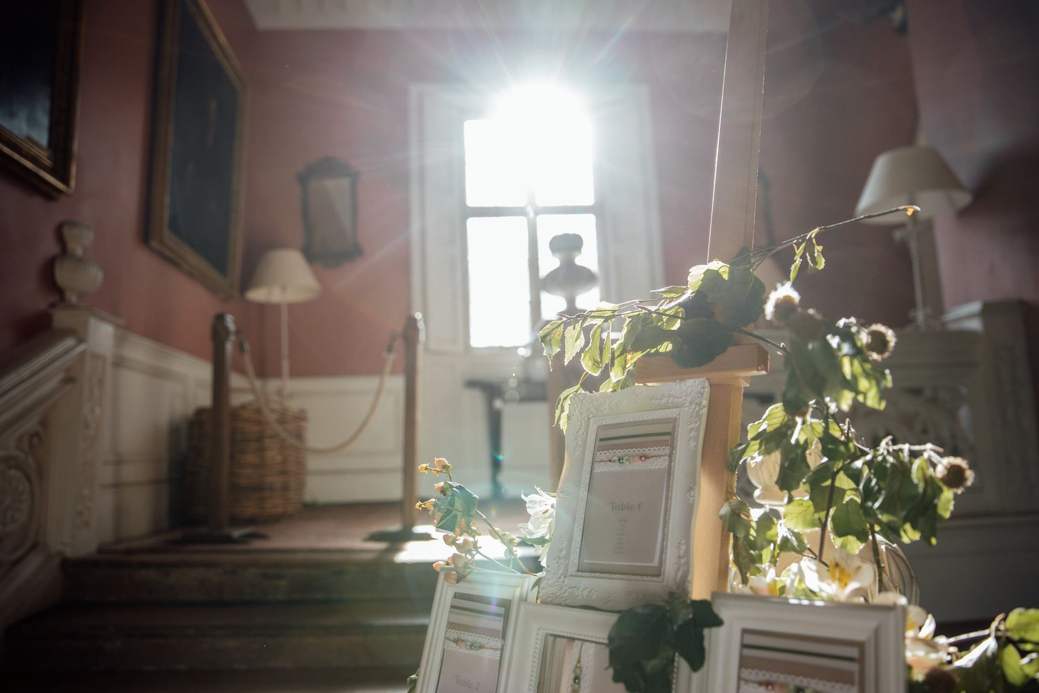A romantic wedding venue interior with soft lighting and elegant decor details.