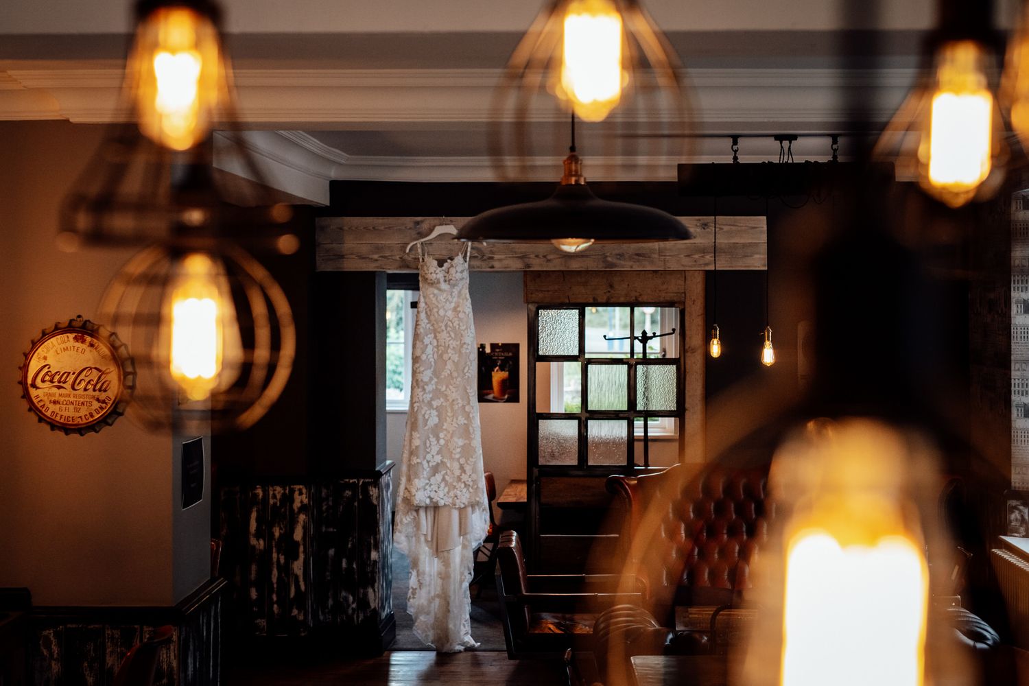Interior space with multiple glowing pendant lights creating ambient atmosphere.