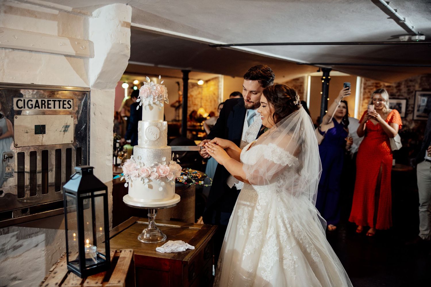 Wedding reception moments captured in elegant indoor venue.
