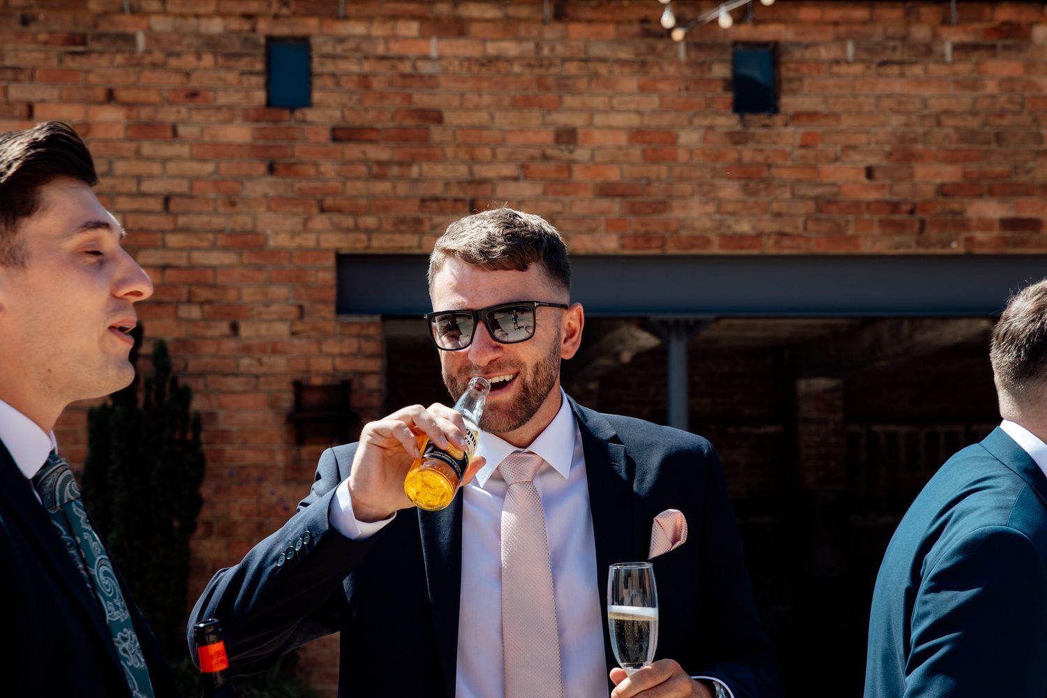 Wedding reception speech moment captured during dinner celebrations.
