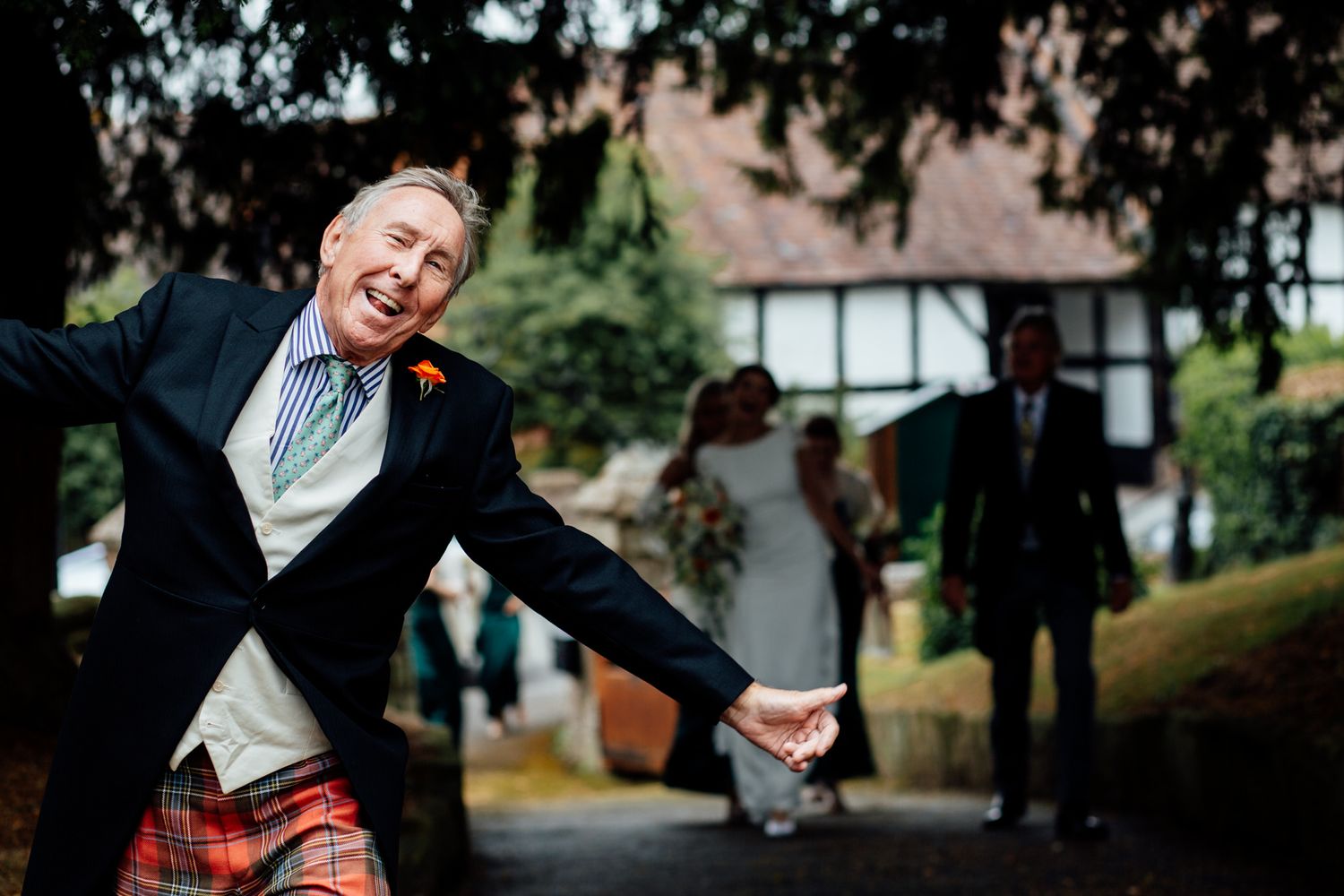 Natural outdoor wedding photography capturing genuine laughter and emotions.
