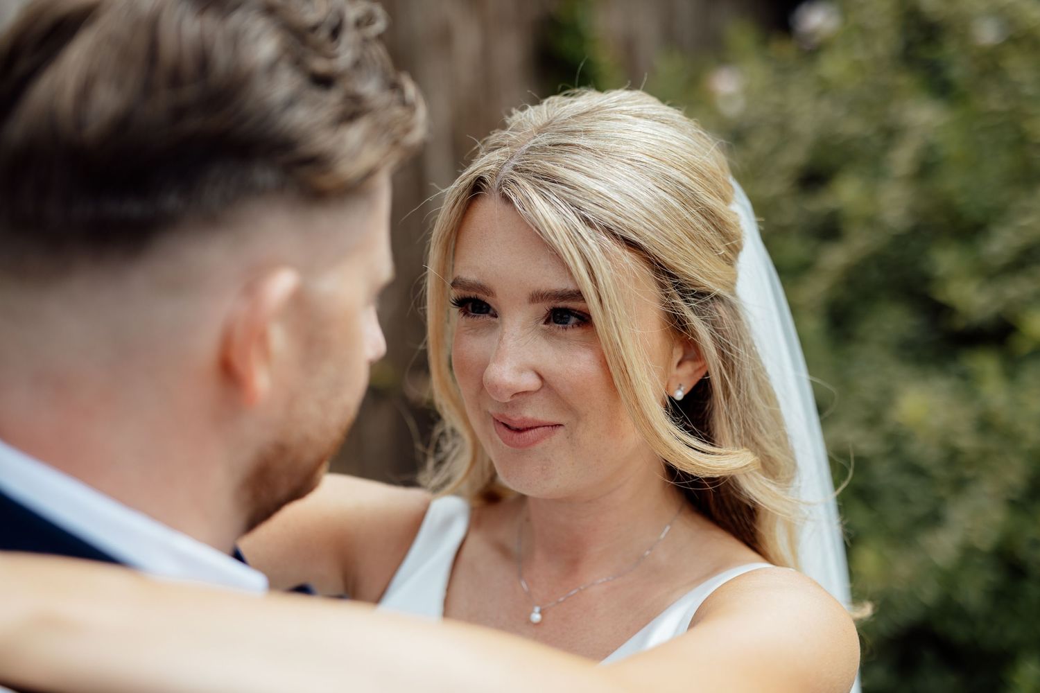 Intimate wedding moments captured in natural outdoor lighting.