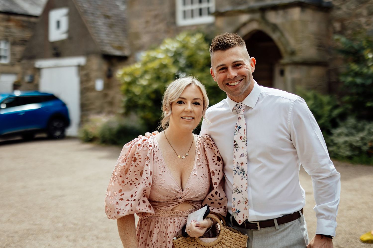 Candid moments captured during a wedding celebration in a rustic outdoor setting.