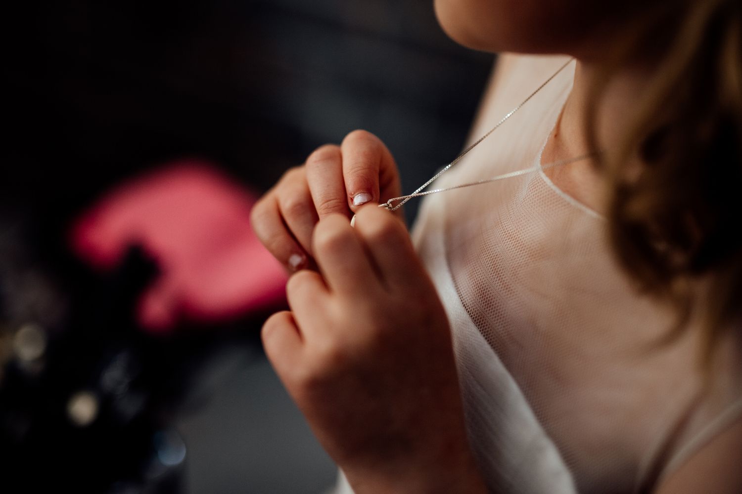 Close-up detail shot of delicate bridal makeup preparation.