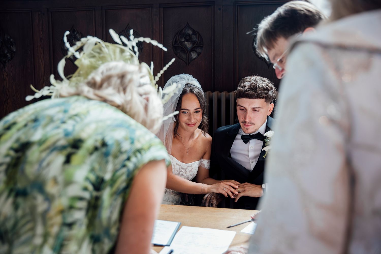 Intimate wedding ceremony moments captured at rustic venue.