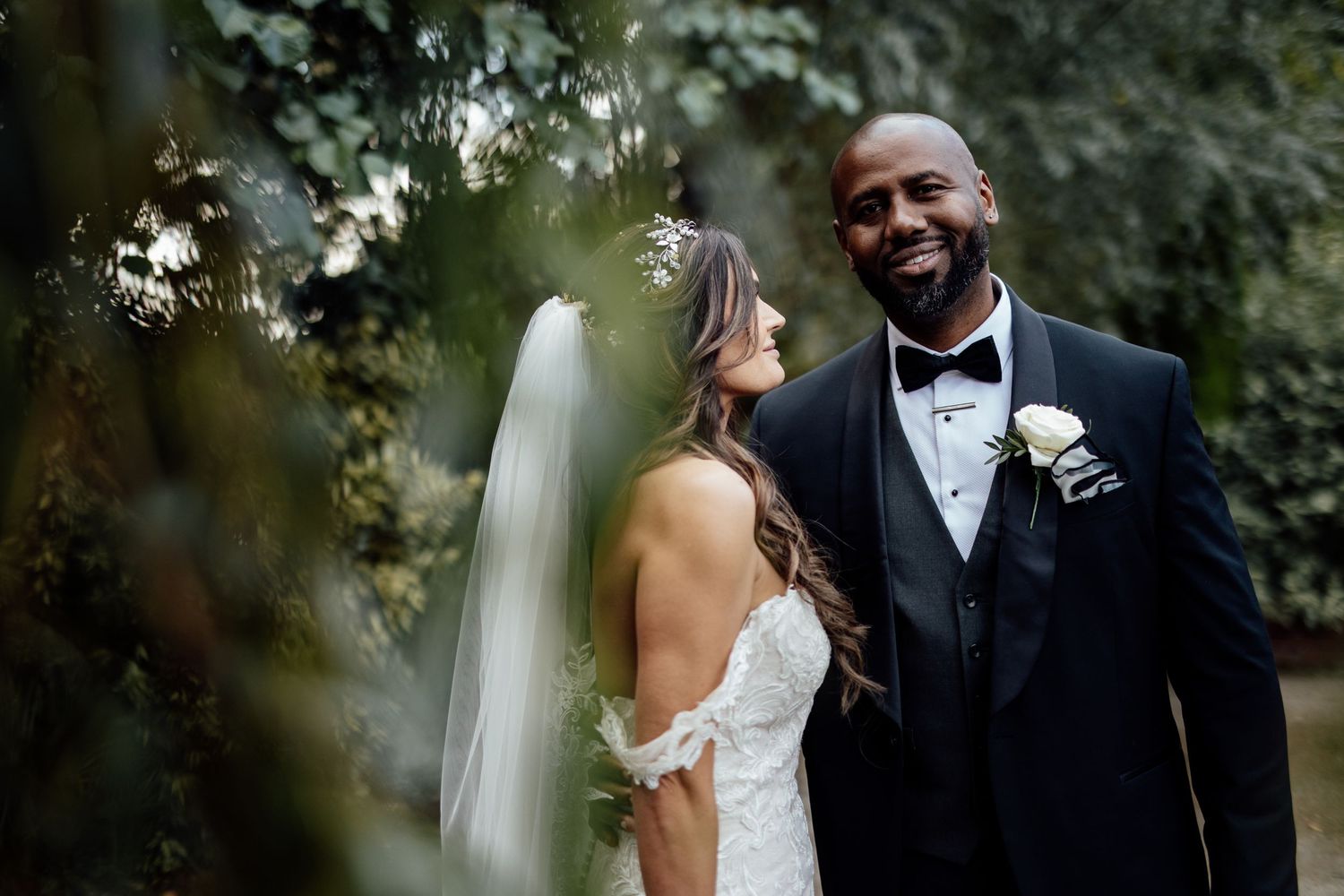 Intimate moments captured during outdoor wedding ceremony.