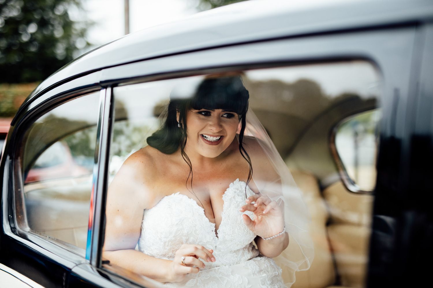 Bride arriving in the car at Alrewas Hayes