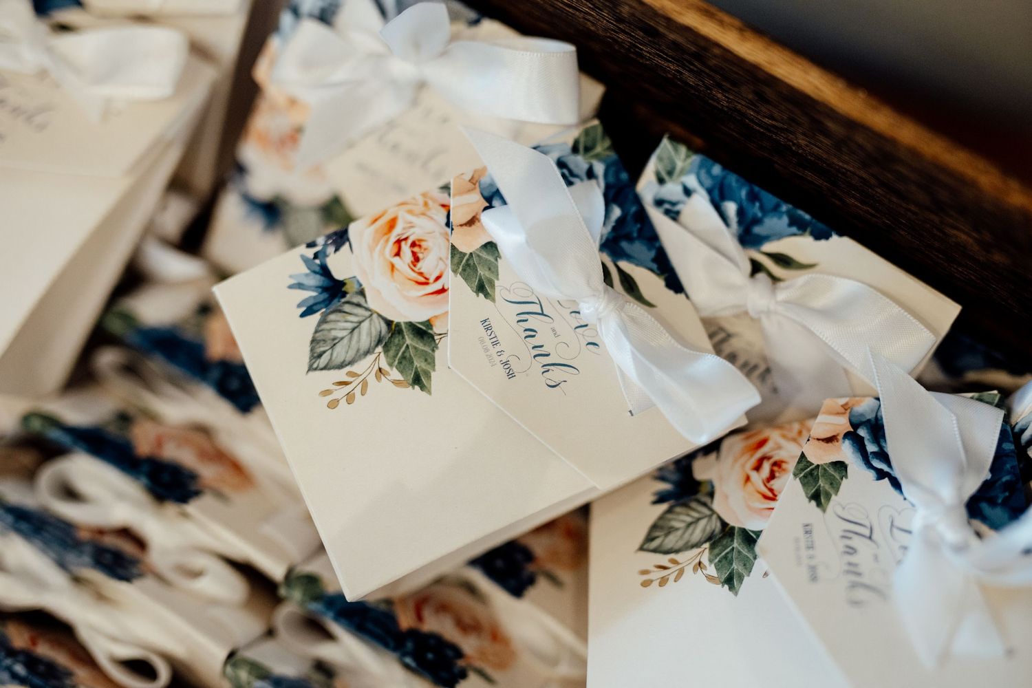 Elegant wedding stationery and floral details on display.
