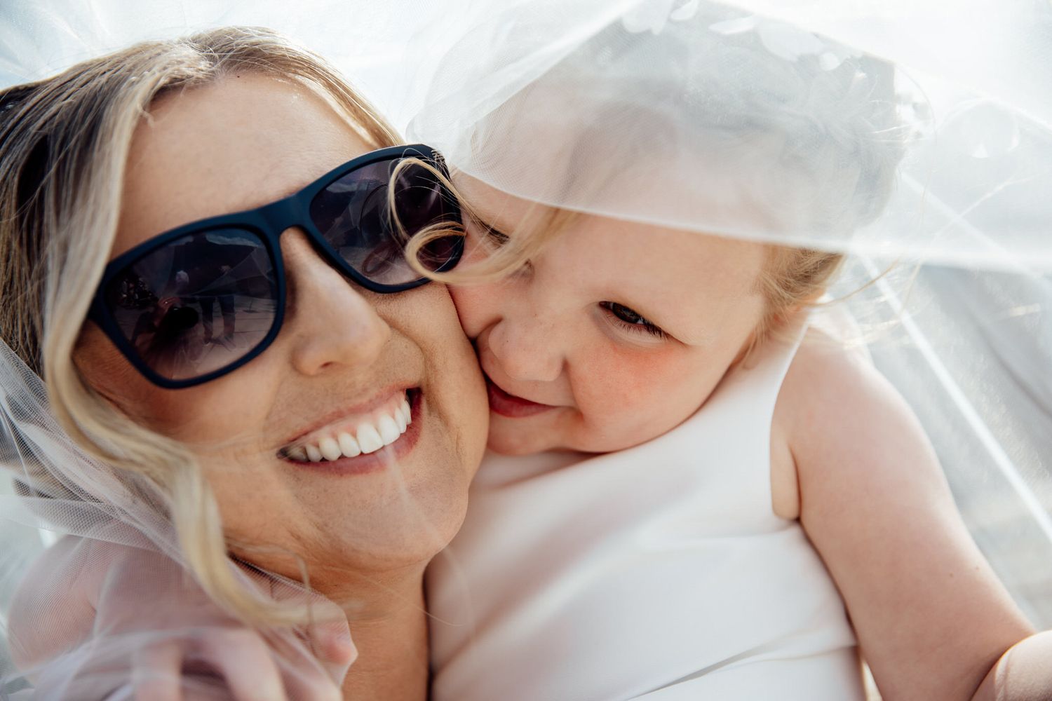 Intimate wedding moments captured in bright natural light.