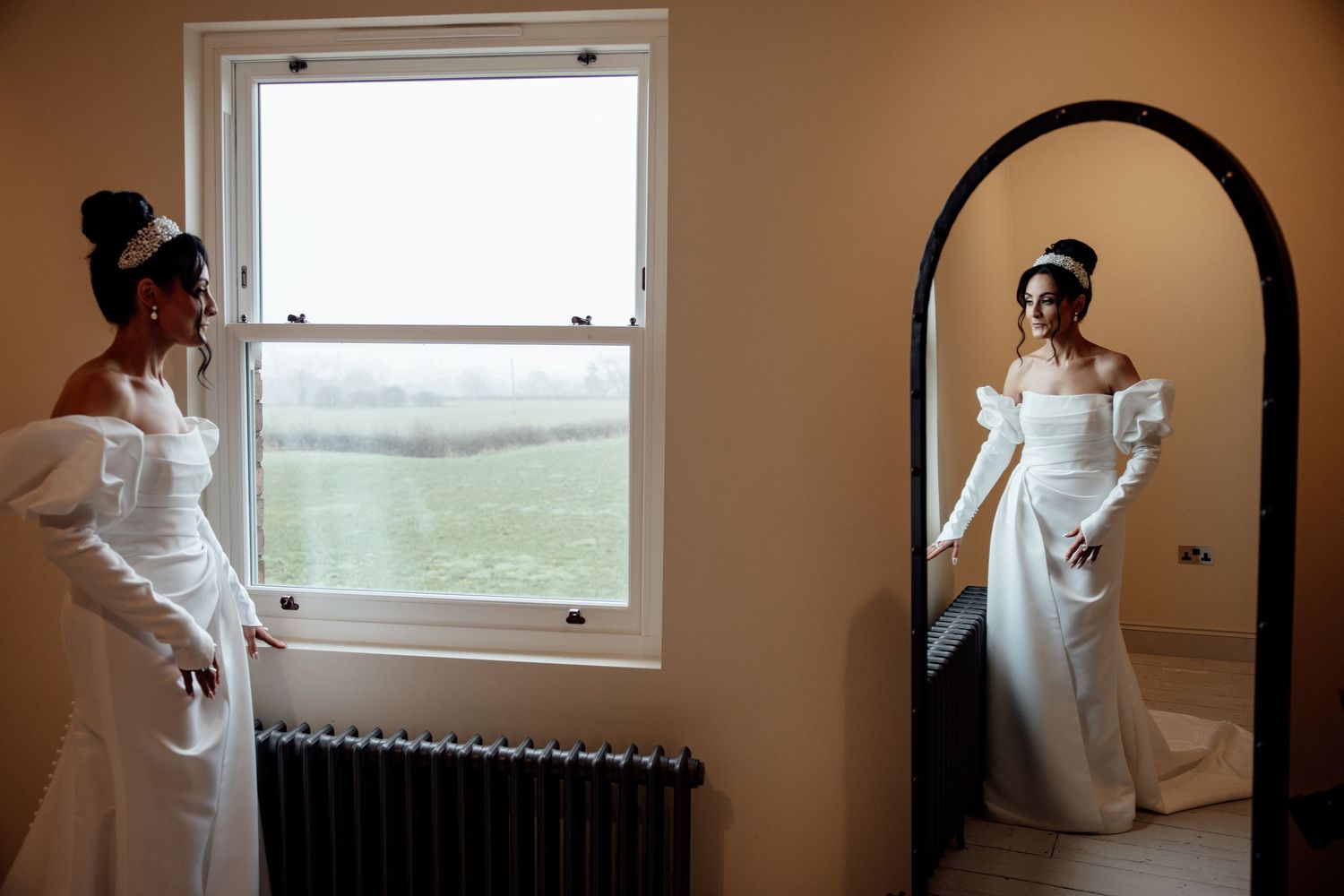 Artistic series of a person in a white dress by a window creating ethereal bridal portraits in natural light.