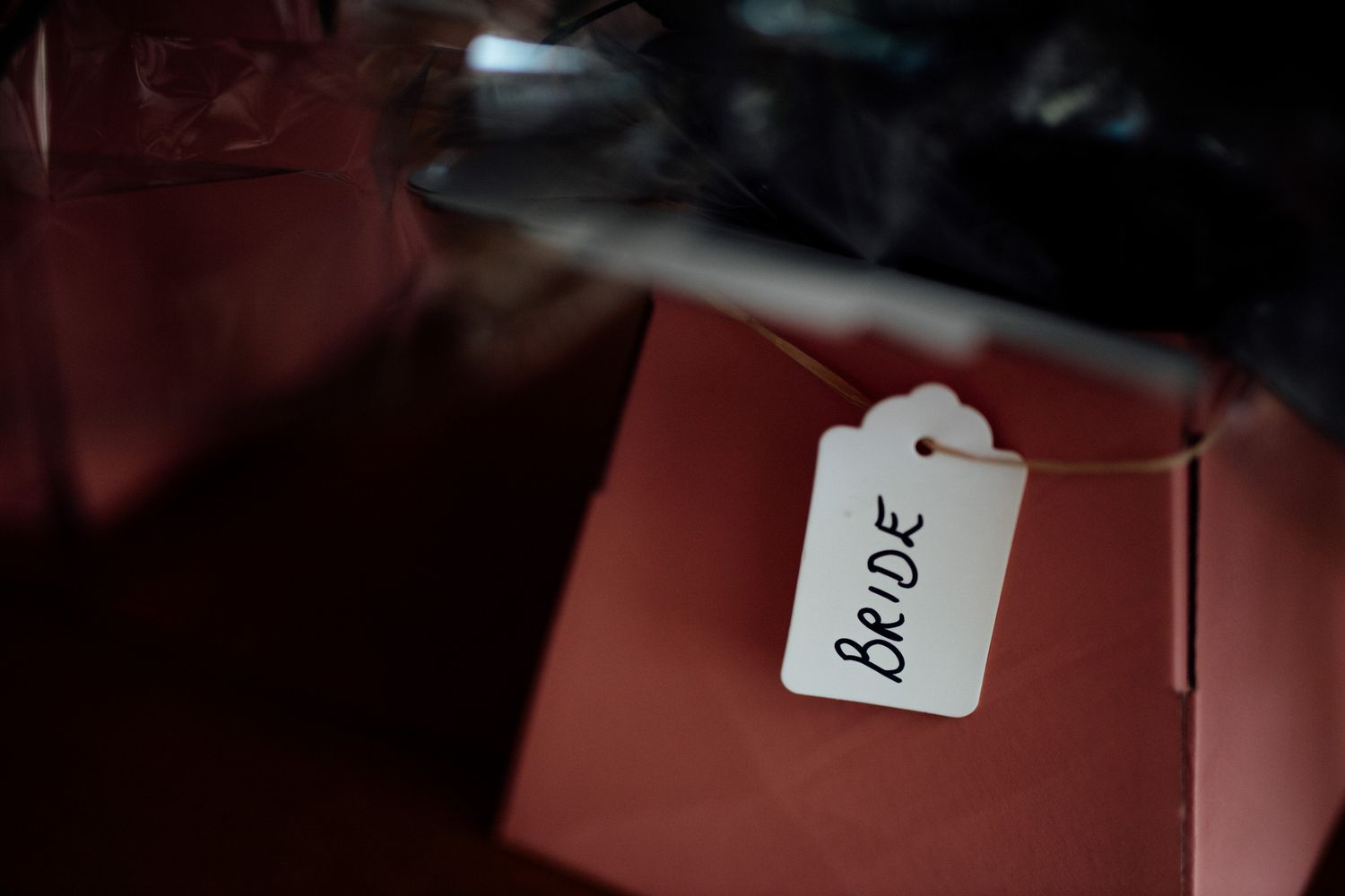 Close-up detail shot of wedding name cards and table settings.