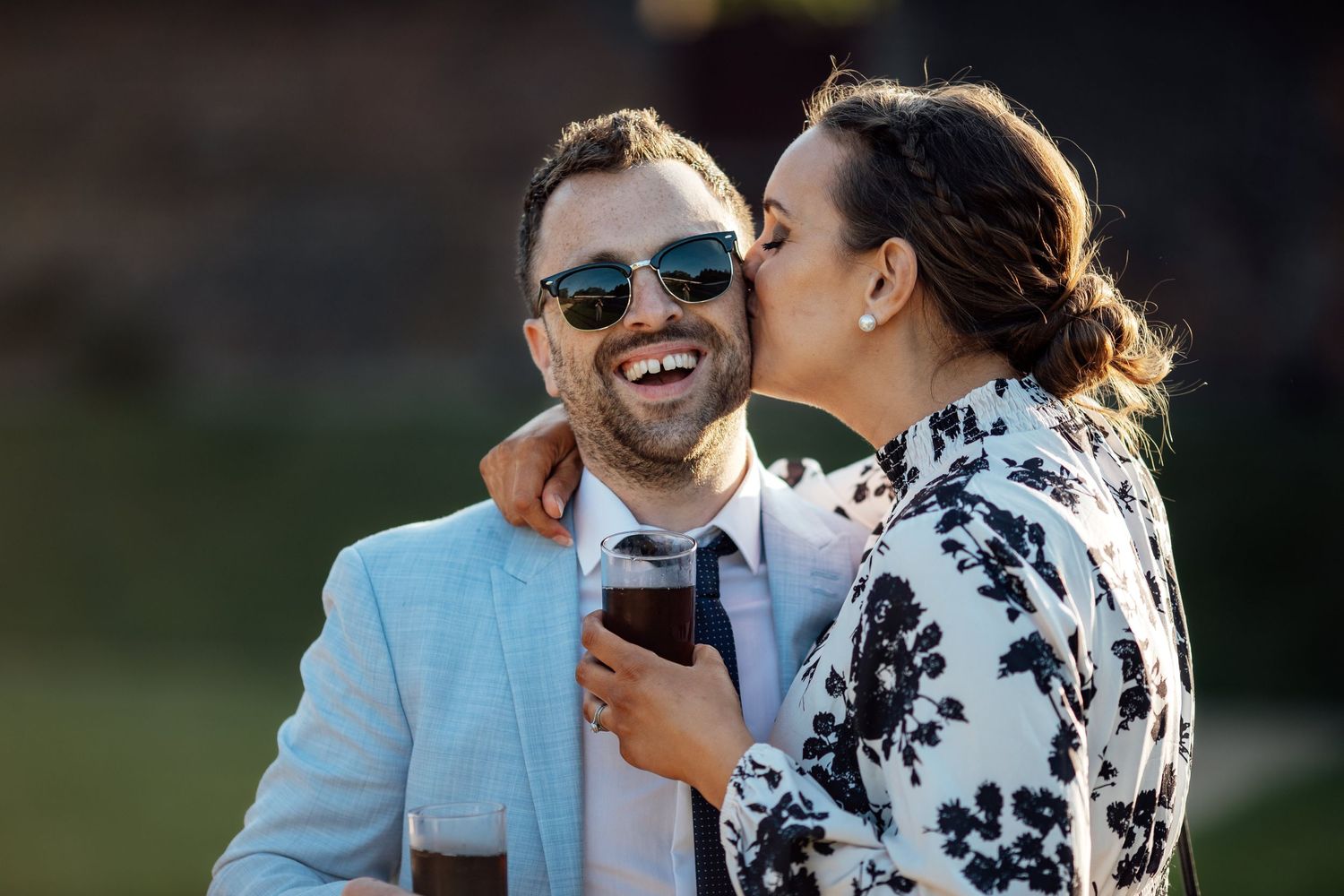 Intimate outdoor wedding portraits captured during golden hour.