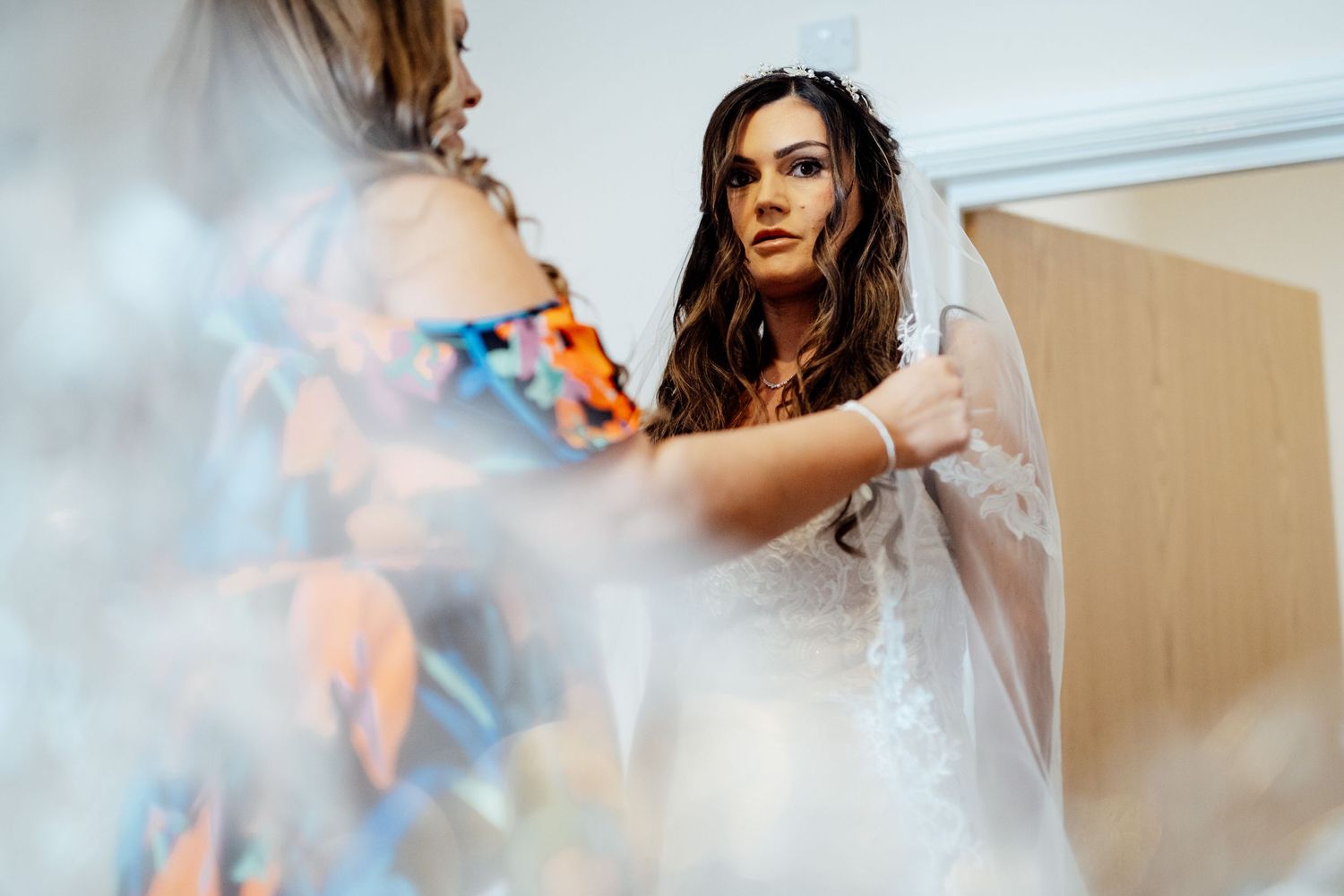 Dreamy bridal portrait through soft focus lens.