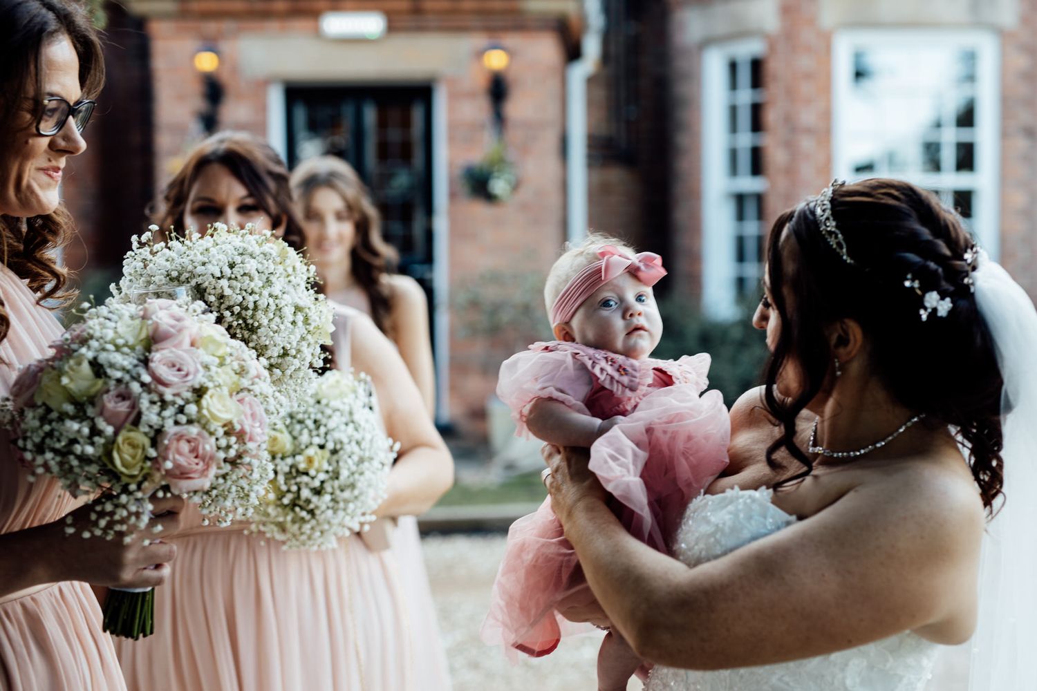 Wedding bouquets featuring white flowers and delicate arrangements.