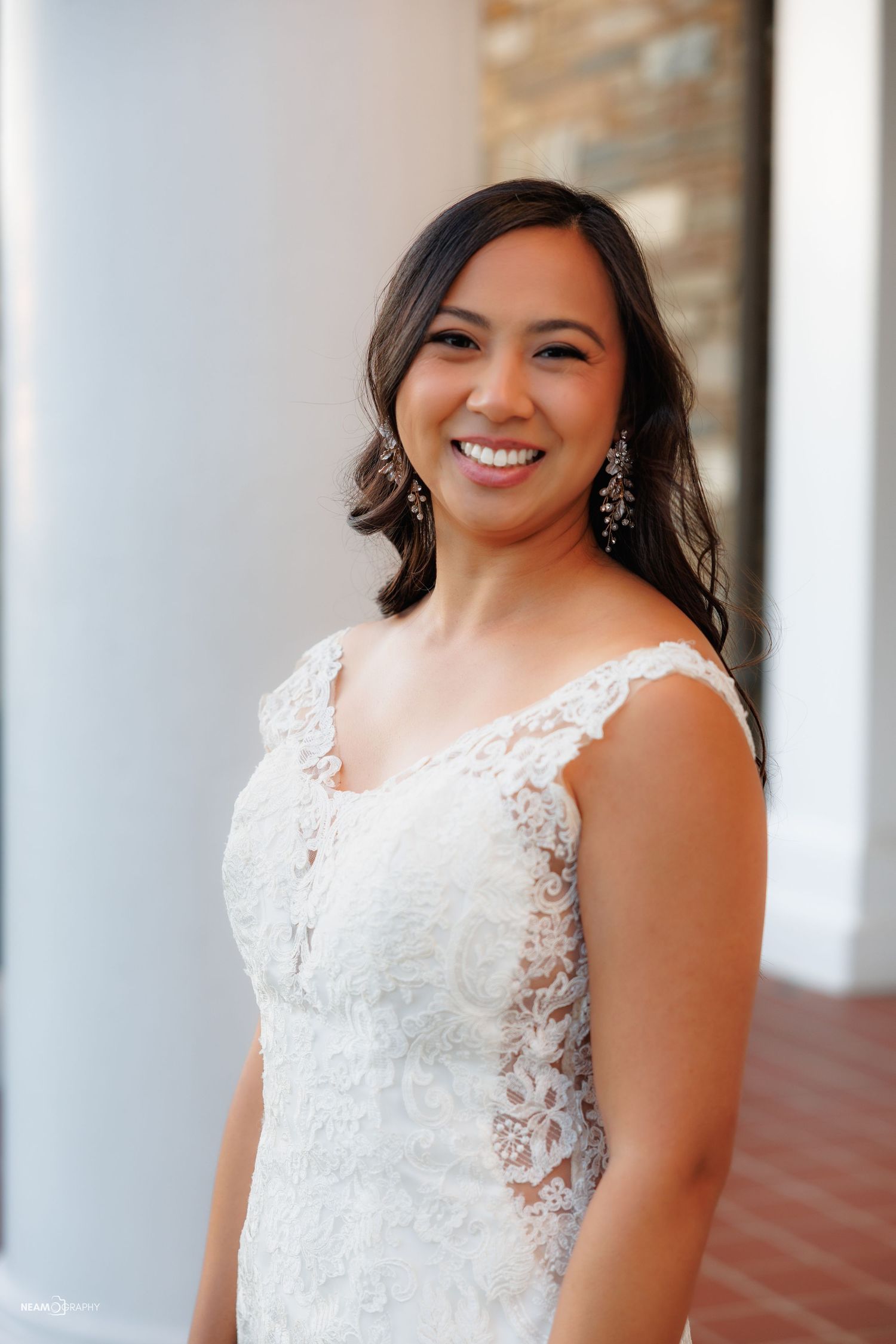 Bridal portrait at Glenview Mansion in Rockville, MD. Elegant wedding photography featuring a smiling bride by Neamography.