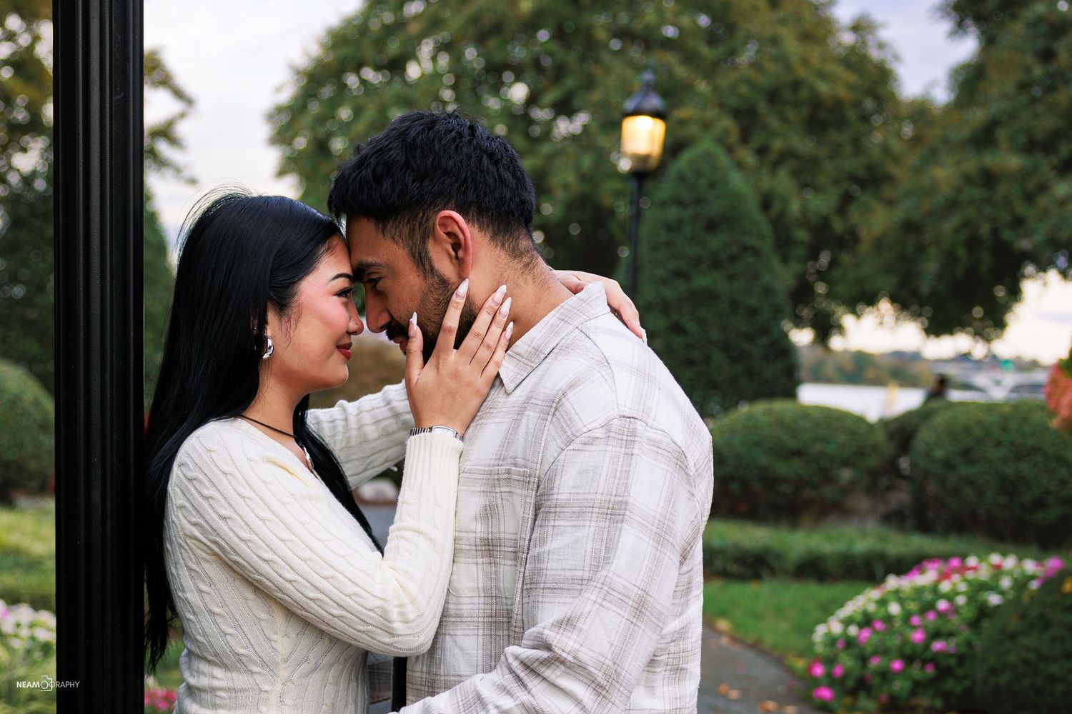 Romantic couple portrait session at the Old Town Alexandria Waterfront Park in Virginia, featuring professional lifestyle photography.