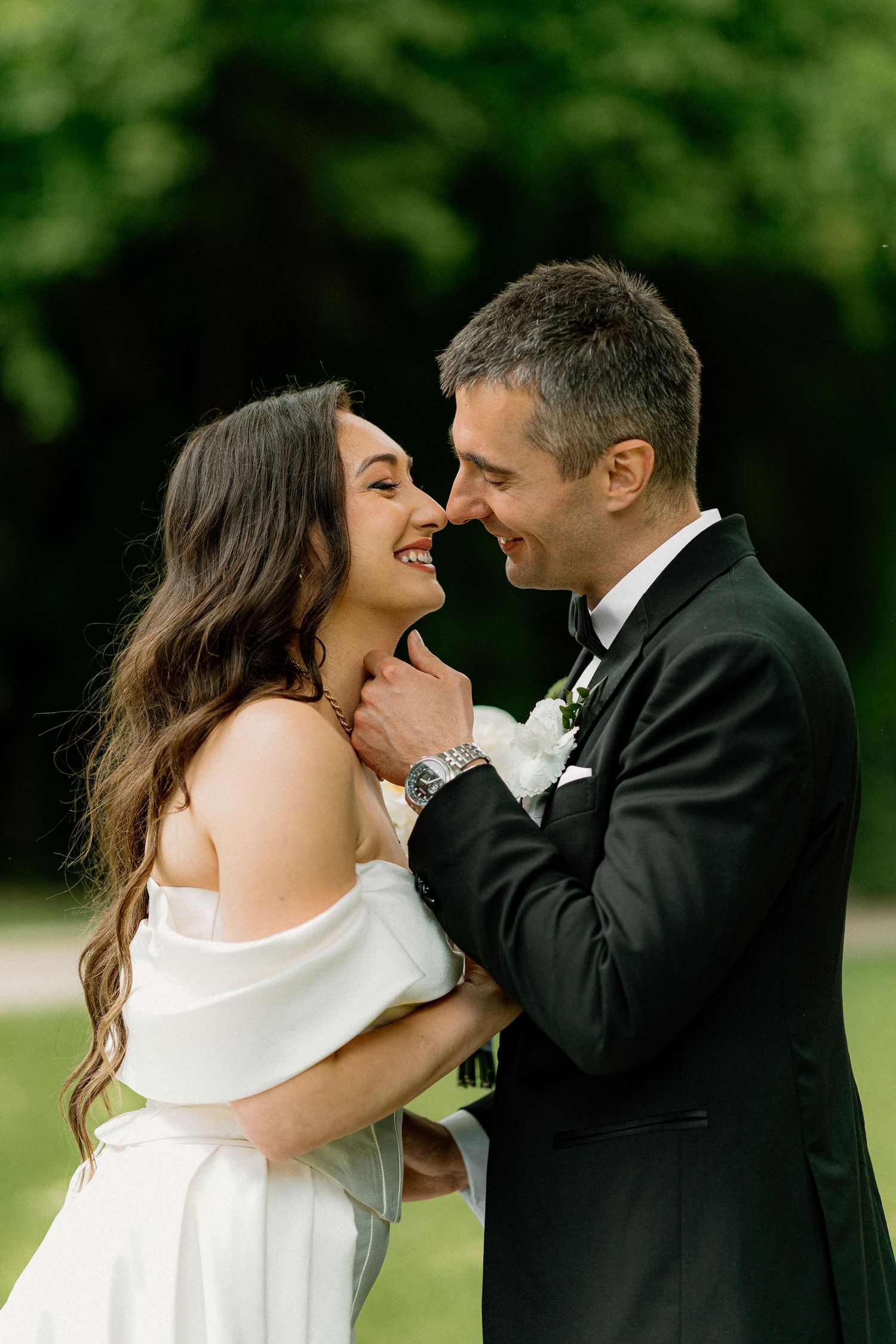 A wedding couple shares tender kisses and loving moments in a romantic outdoor photo sequence.