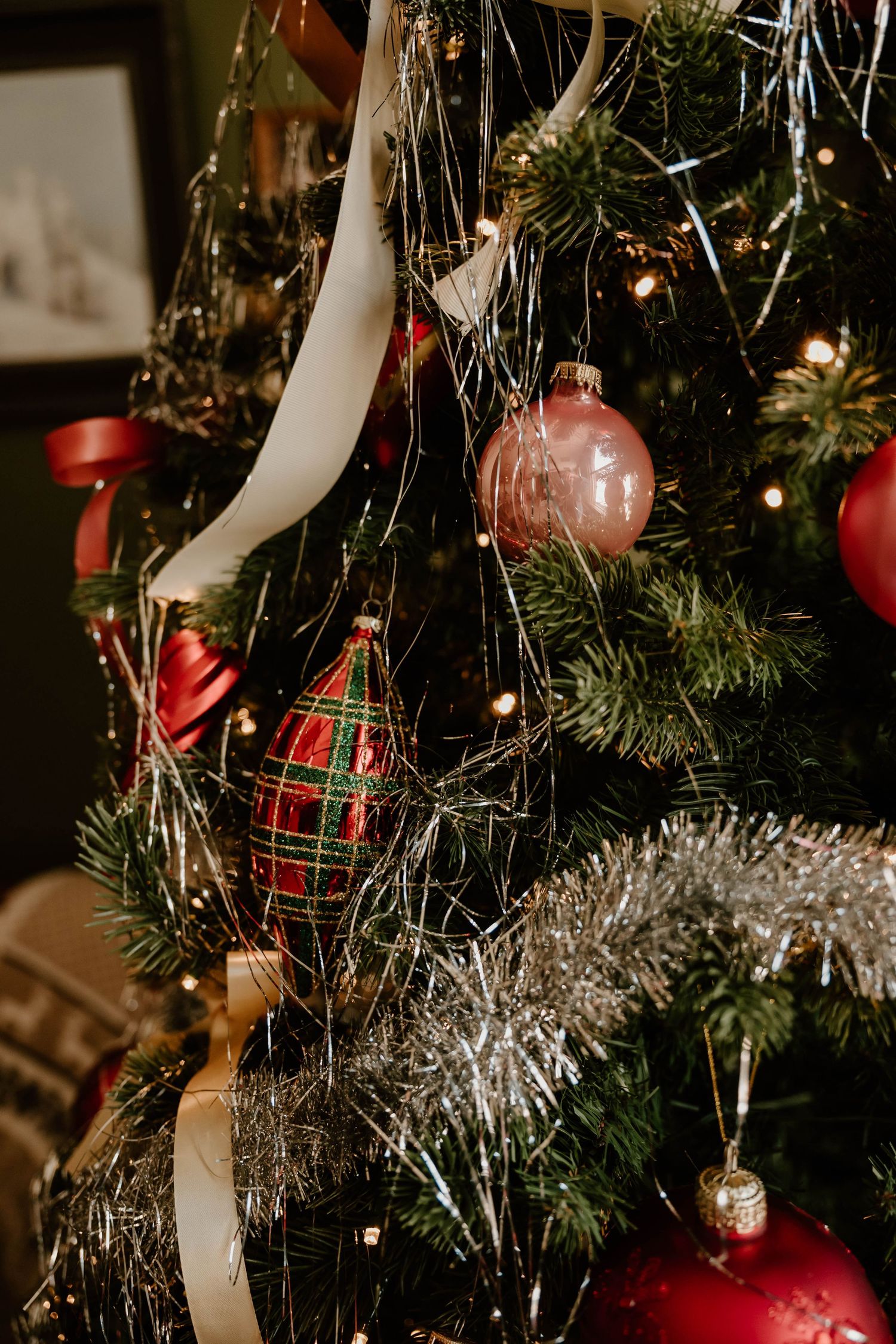 Close-up of festive Christmas tree decorations and holiday styling inside Everwild Collective Studio's seasonal photography setup in Spokane