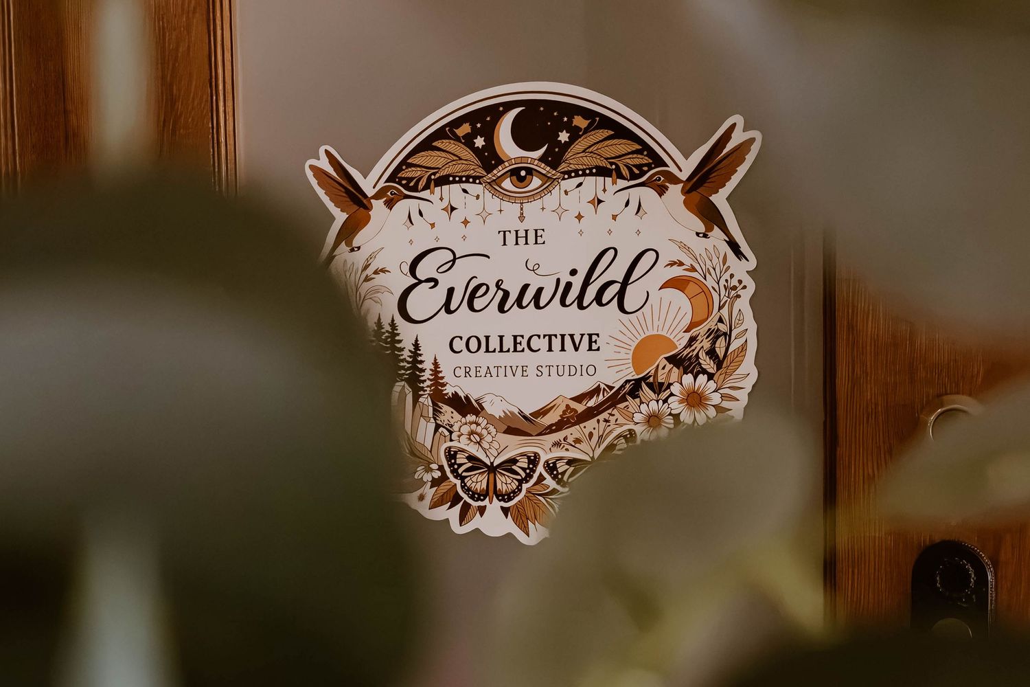 Everwild Collective Studio sign displayed inside the creative photography studio rental in Spokane, WA.