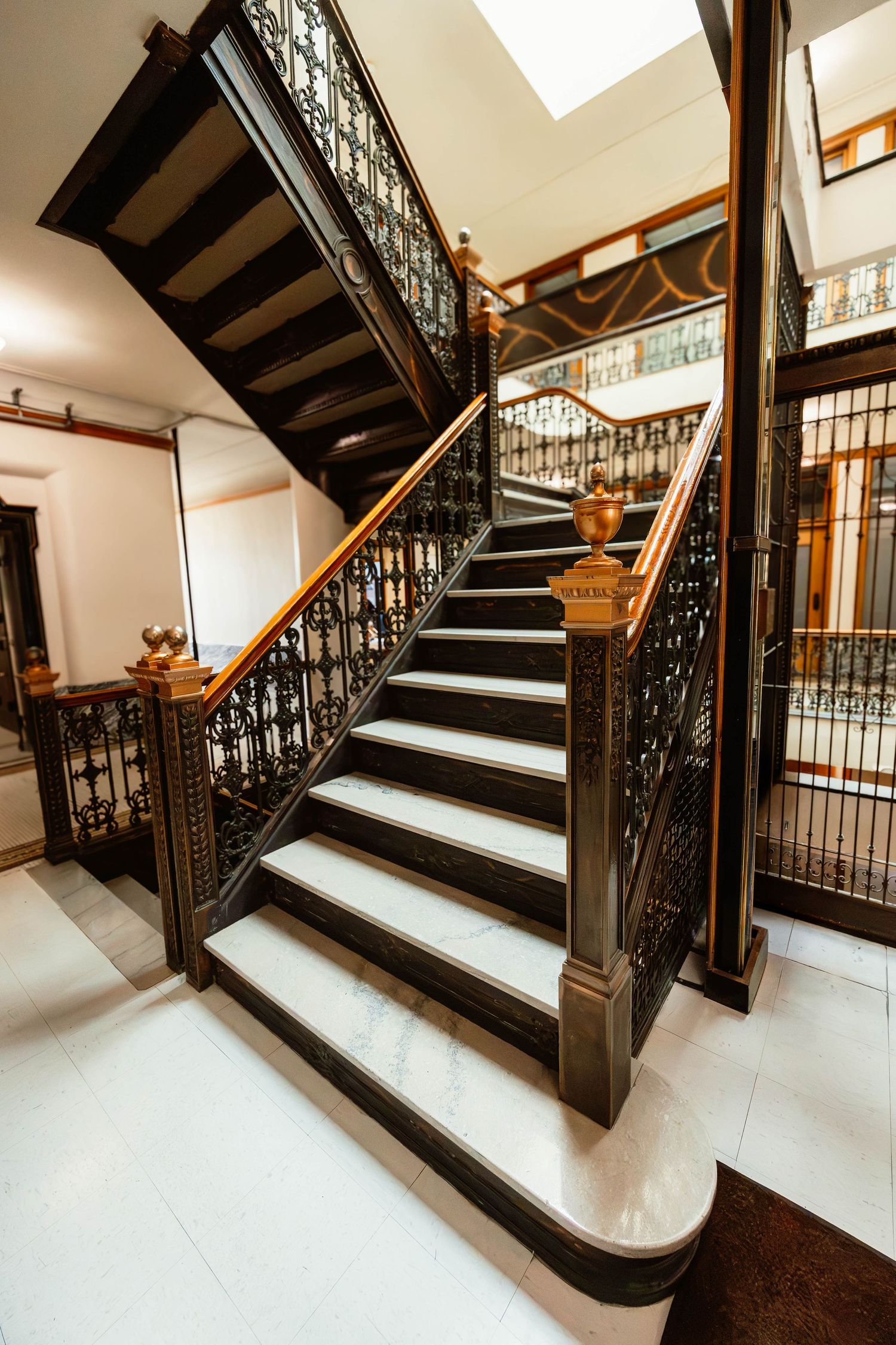 Historic interior staircase and architectural details near Everwild Collective Studio in Downtown Spokane, Washington.