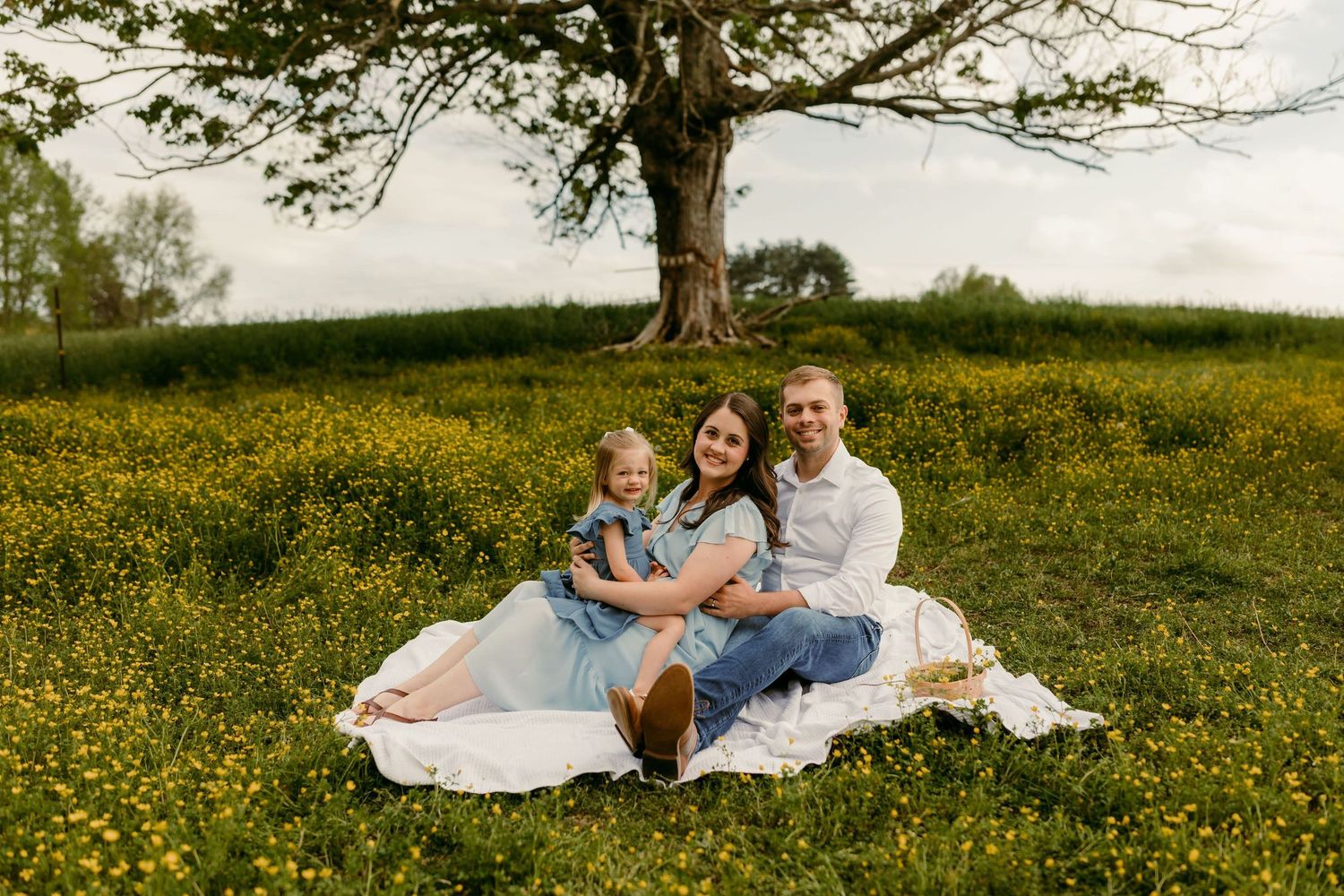 Family session in a beautiful field of flowers