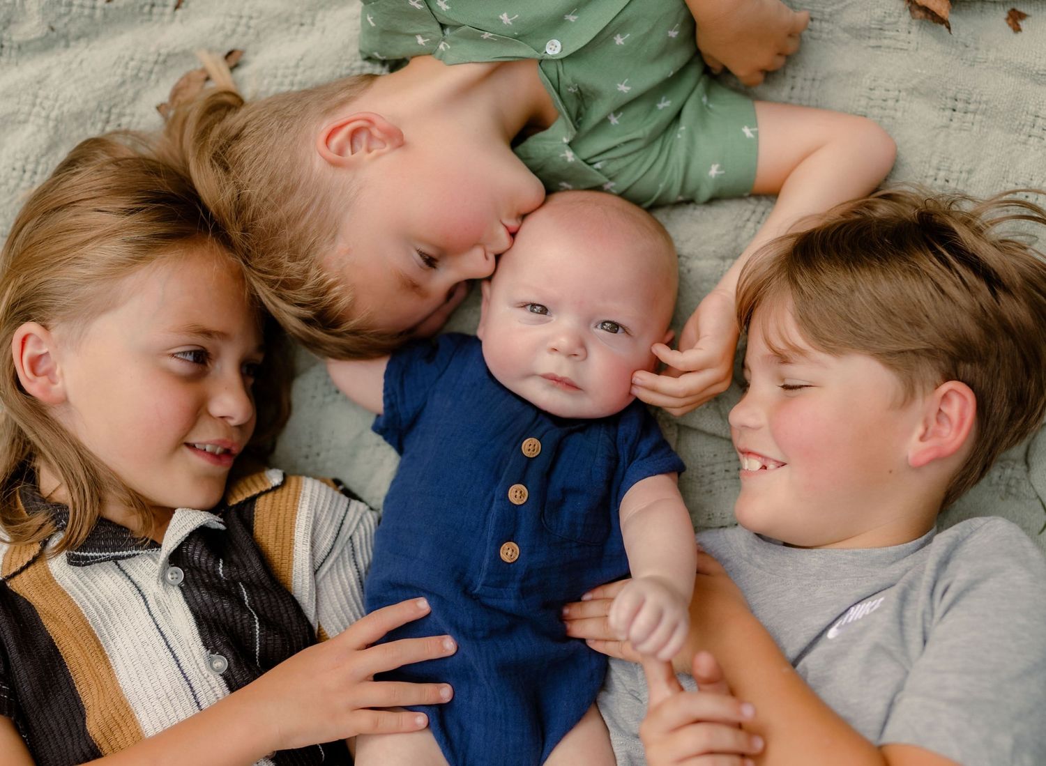 Family photos of all 4 boys