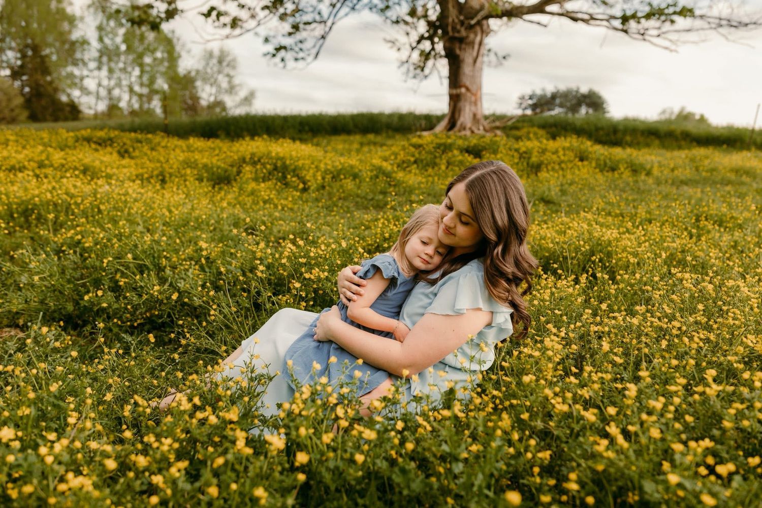 Mom and daughter pictures in yellow flowers