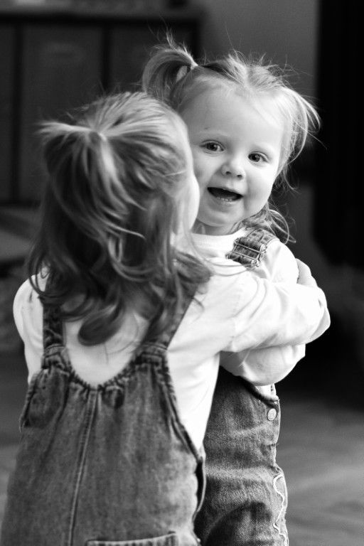Authentic sibling connection captured in black and white by Sarah Cullen, Abergavenny