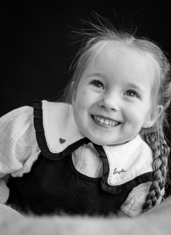 Authentic child smiling and showing personality in South Wales photography shoot